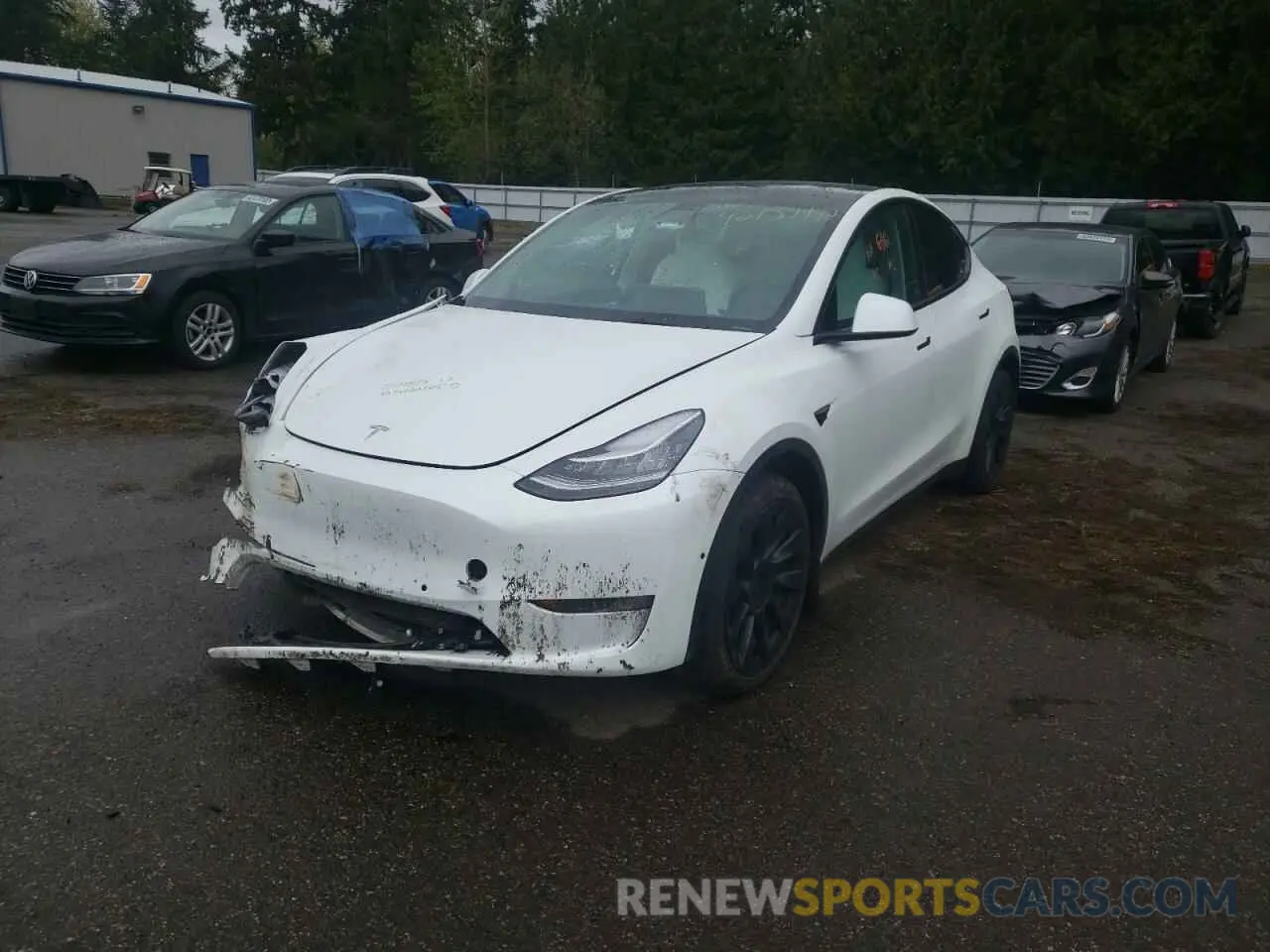 2 fotografías del automóvil dañado 5YJYGDEE1MF277063 TESLA MODEL Y 2021