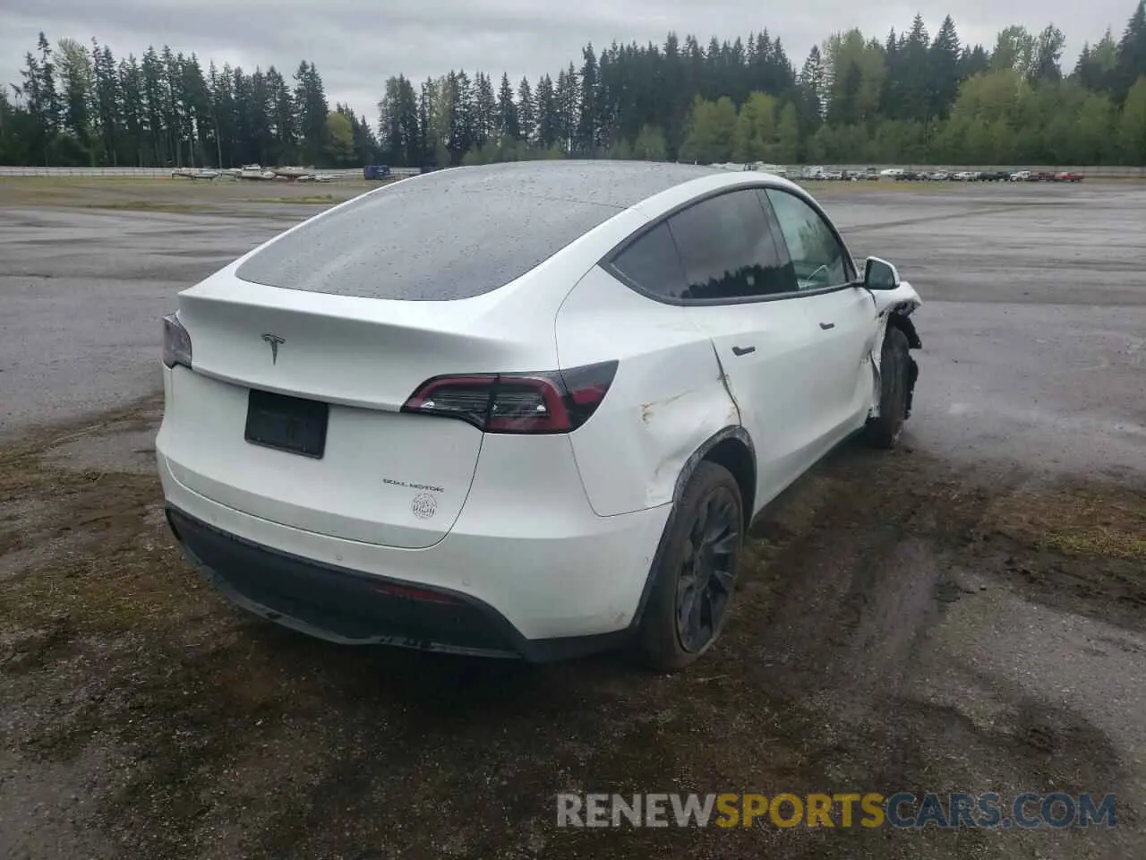 4 fotografías del automóvil dañado 5YJYGDEE1MF277063 TESLA MODEL Y 2021