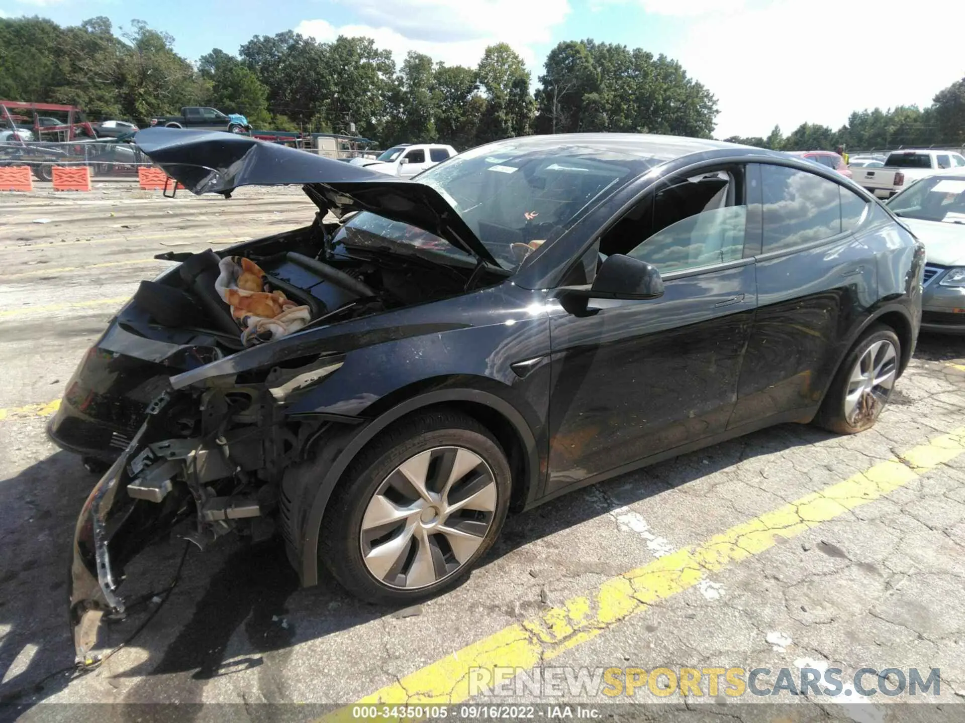 2 fotografías del automóvil dañado 5YJYGDEE1MF293604 TESLA MODEL Y 2021