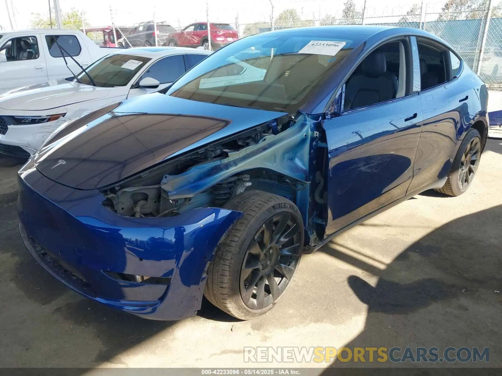 2 fotografías del automóvil dañado 5YJYGDEE1MF296454 TESLA MODEL Y 2021