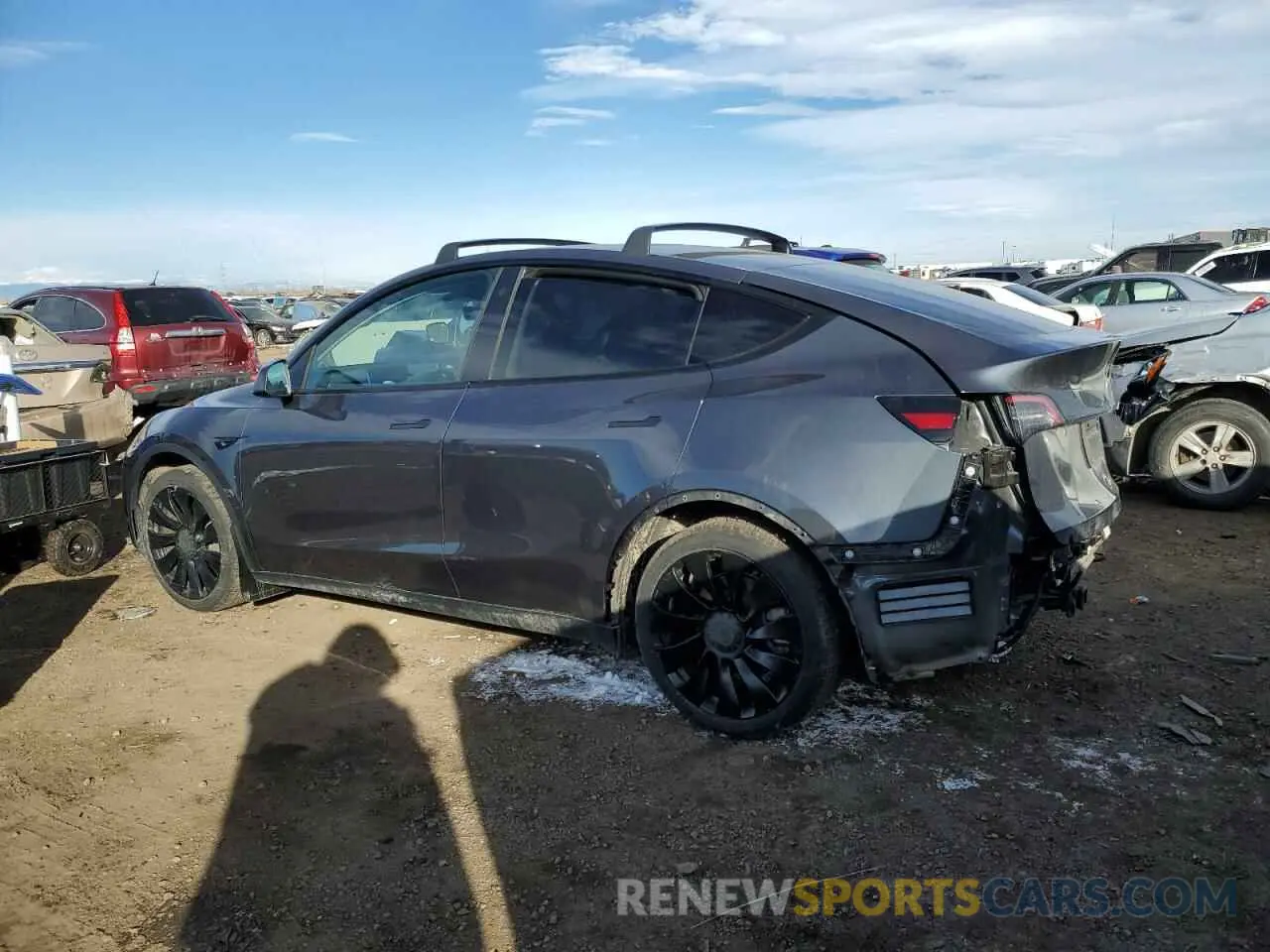 2 fotografías del automóvil dañado 5YJYGDEE2MF065398 TESLA MODEL Y 2021
