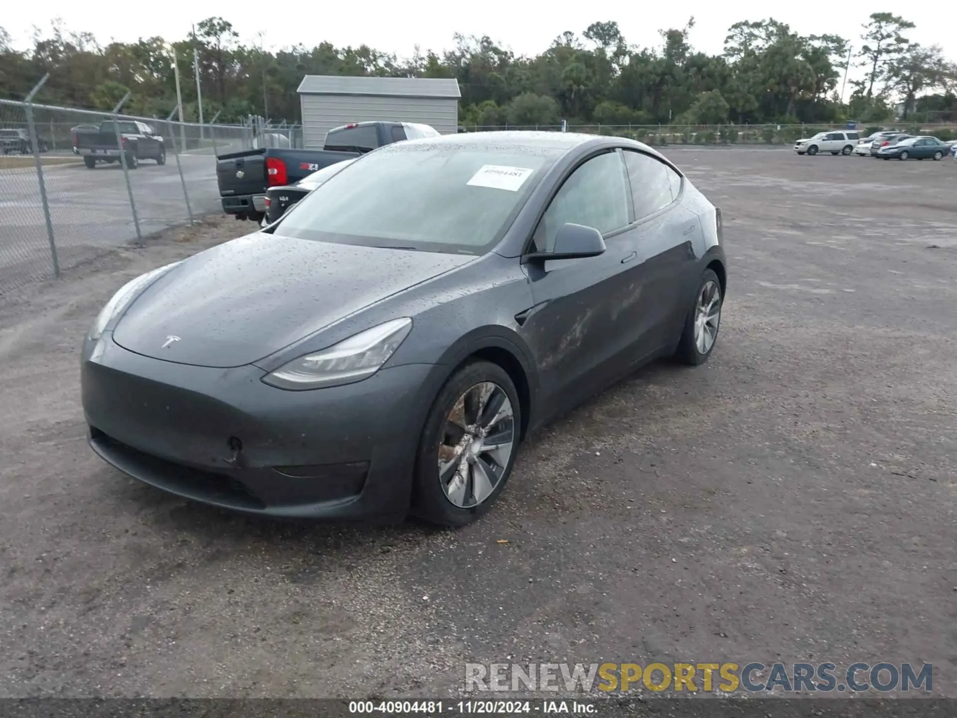 2 fotografías del automóvil dañado 5YJYGDEE2MF068768 TESLA MODEL Y 2021