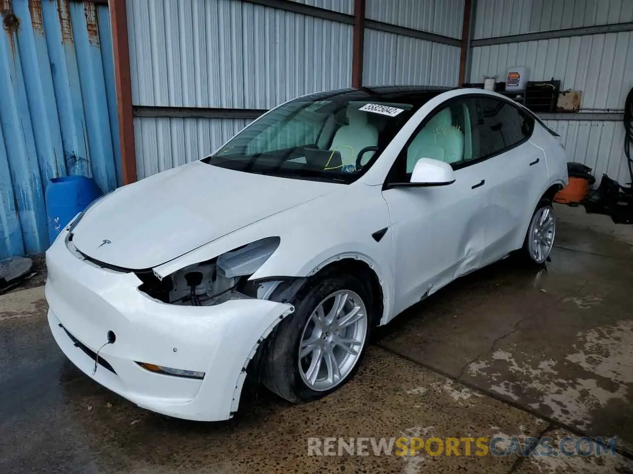 2 fotografías del automóvil dañado 5YJYGDEE2MF083092 TESLA MODEL Y 2021