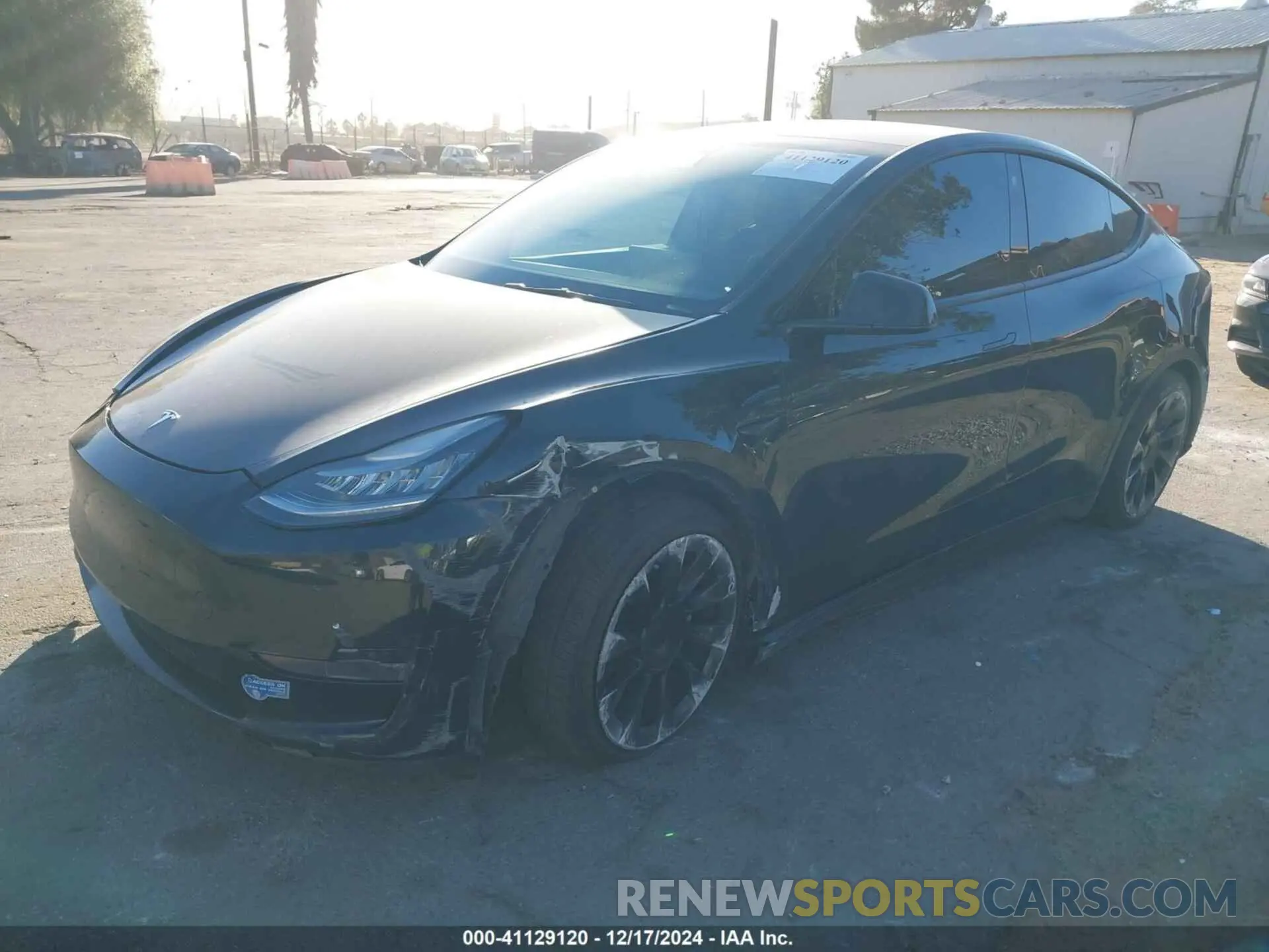2 fotografías del automóvil dañado 5YJYGDEE2MF097316 TESLA MODEL Y 2021