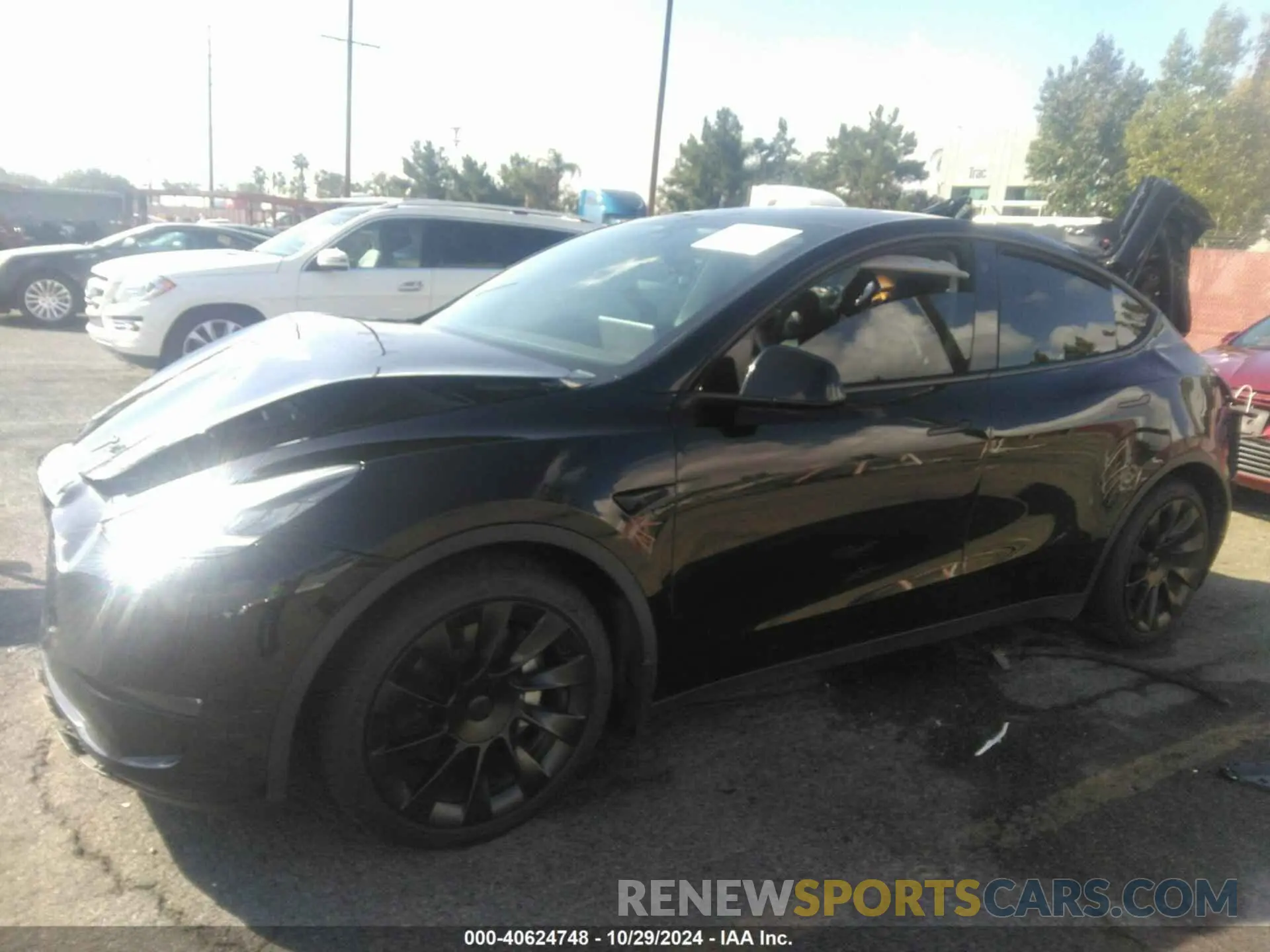 2 fotografías del automóvil dañado 5YJYGDEE2MF097624 TESLA MODEL Y 2021
