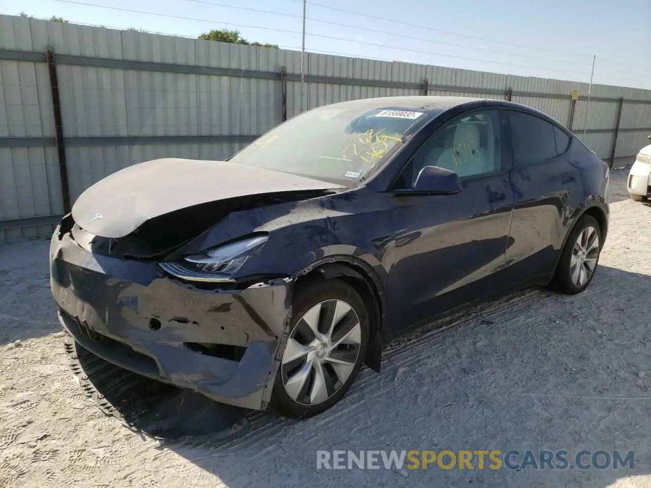2 fotografías del automóvil dañado 5YJYGDEE2MF262409 TESLA MODEL Y 2021