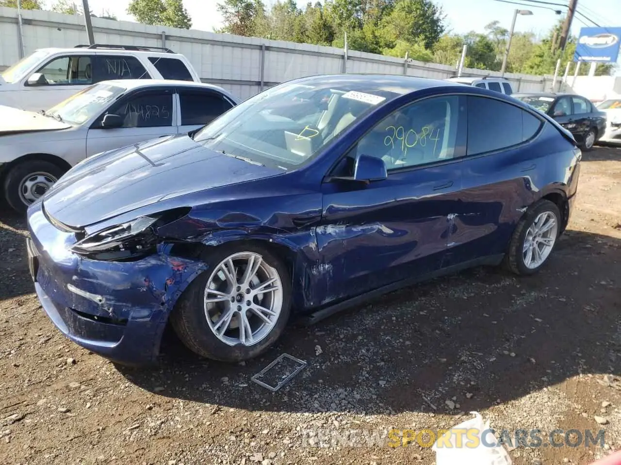 9 fotografías del automóvil dañado 5YJYGDEE3MF063711 TESLA MODEL Y 2021