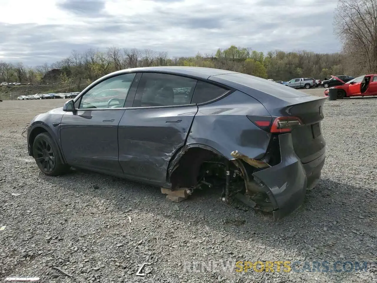 2 fotografías del automóvil dañado 5YJYGDEE3MF064762 TESLA MODEL Y 2021