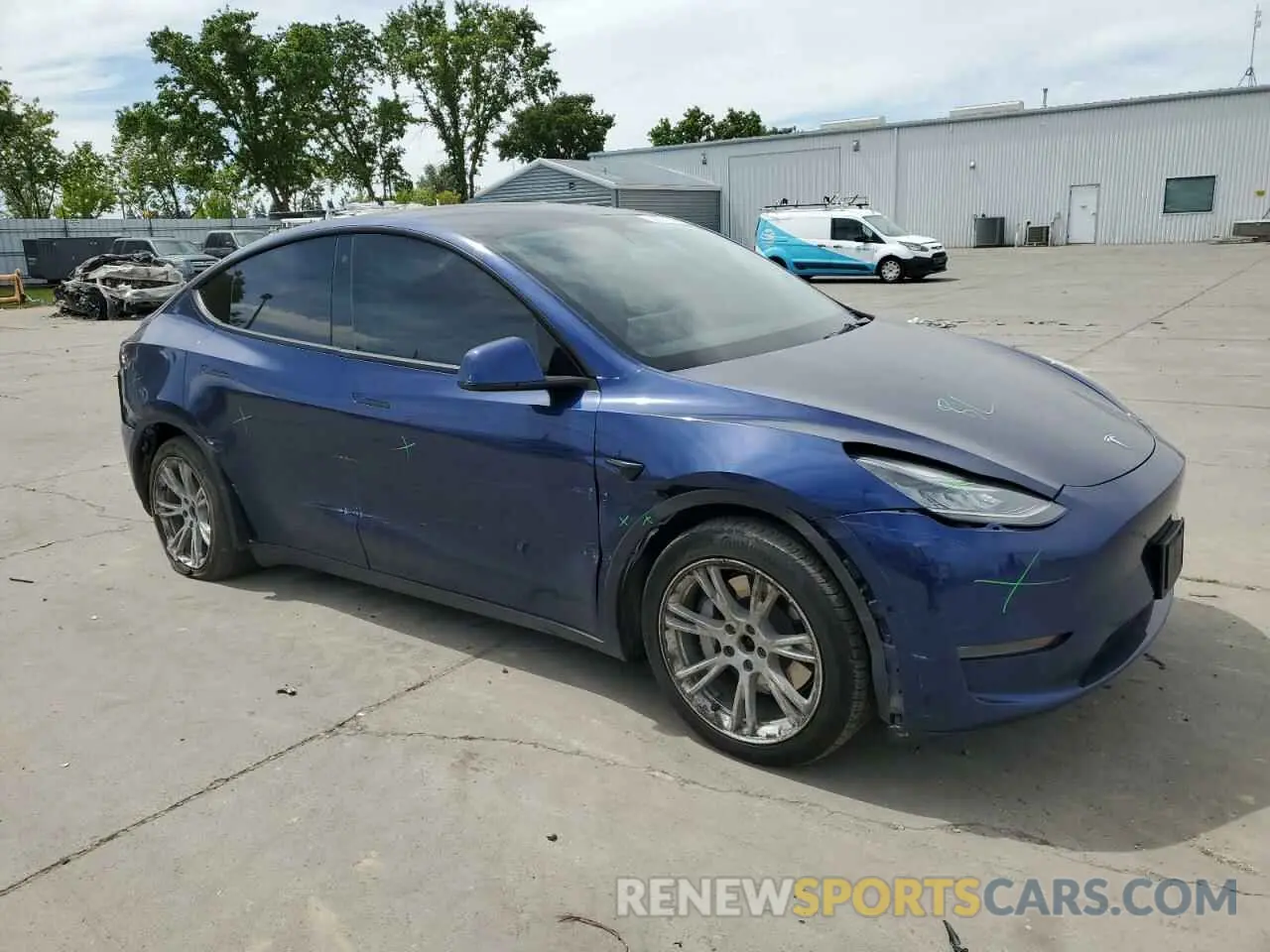 4 fotografías del automóvil dañado 5YJYGDEE3MF094165 TESLA MODEL Y 2021
