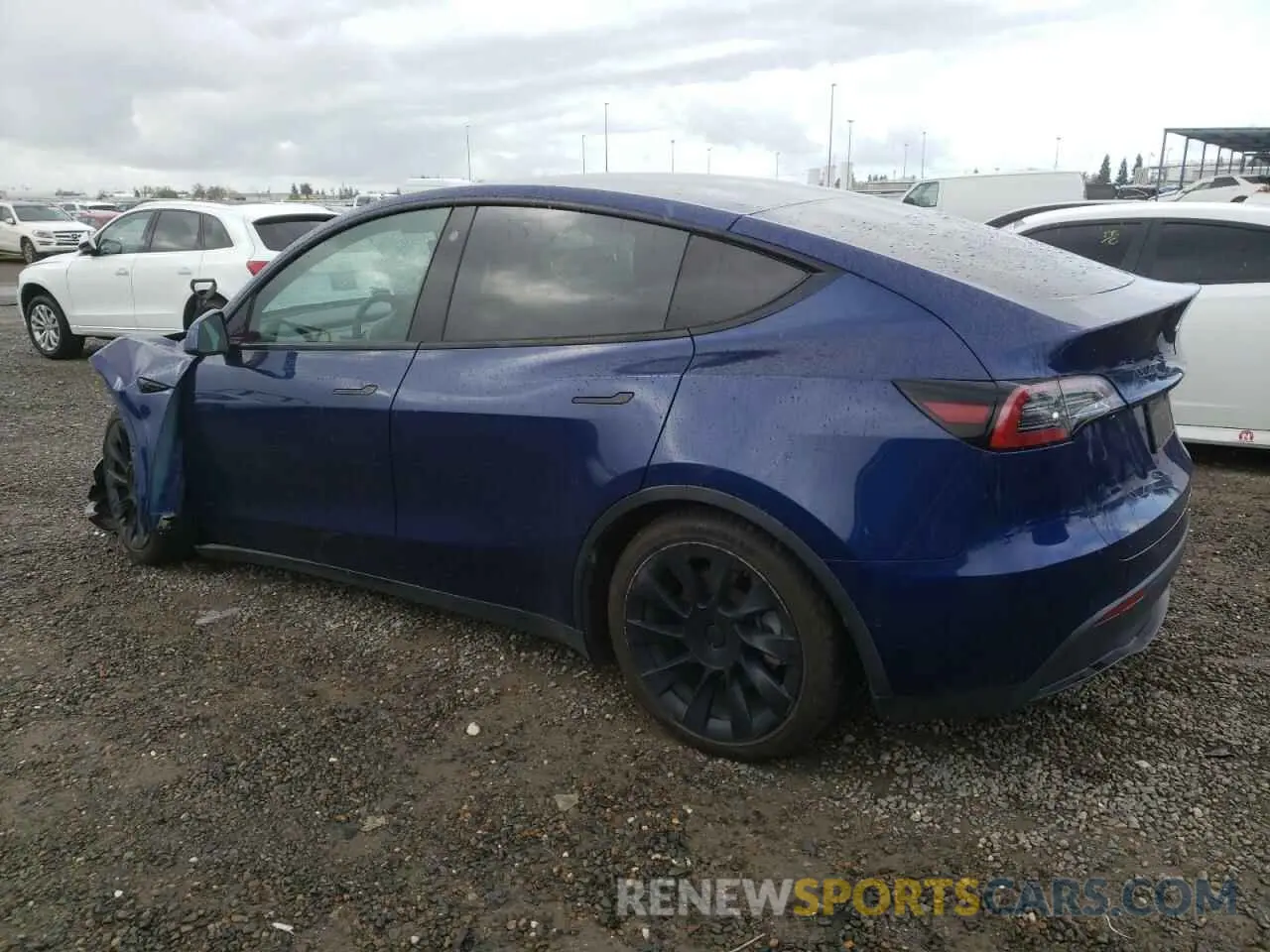 2 fotografías del automóvil dañado 5YJYGDEE3MF143185 TESLA MODEL Y 2021