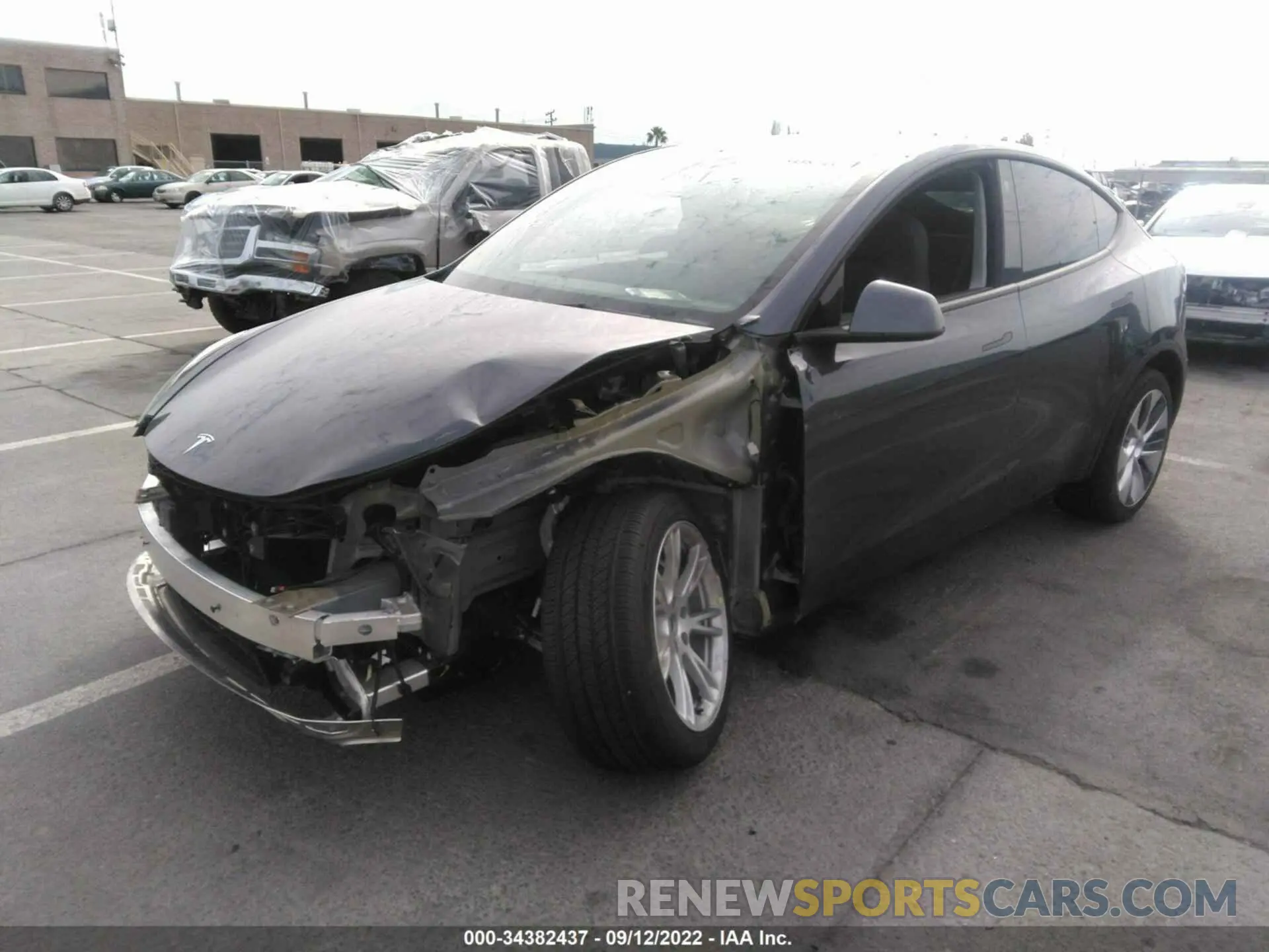 2 fotografías del automóvil dañado 5YJYGDEE3MF146328 TESLA MODEL Y 2021