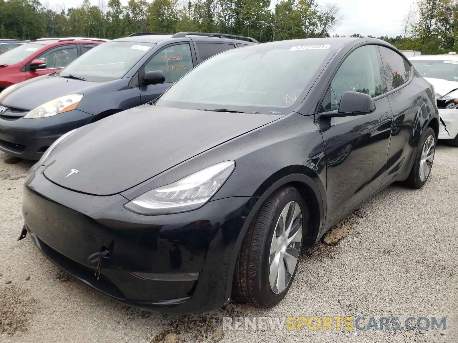 2 fotografías del automóvil dañado 5YJYGDEE3MF190832 TESLA MODEL Y 2021