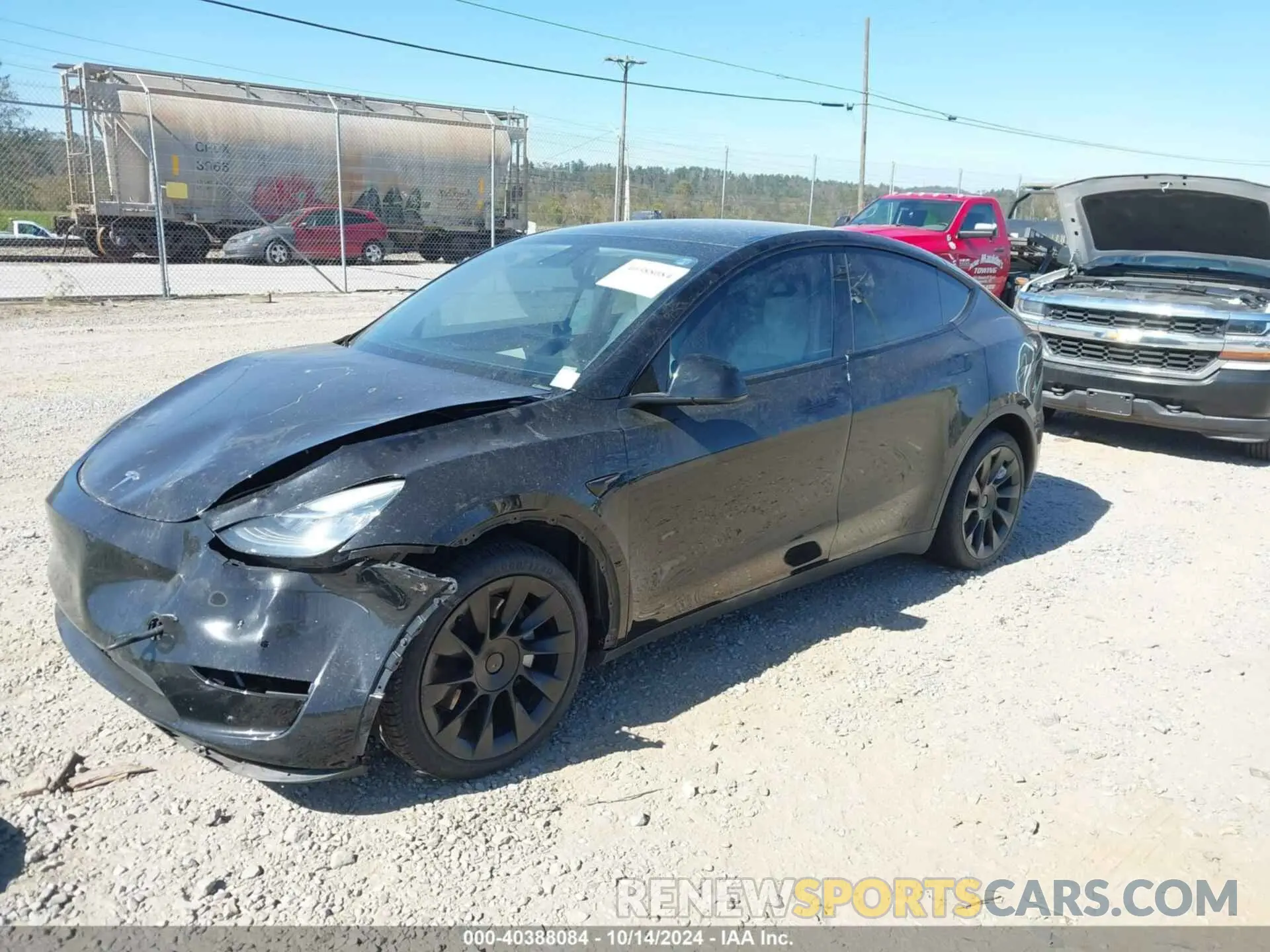 2 fotografías del automóvil dañado 5YJYGDEE3MF248485 TESLA MODEL Y 2021