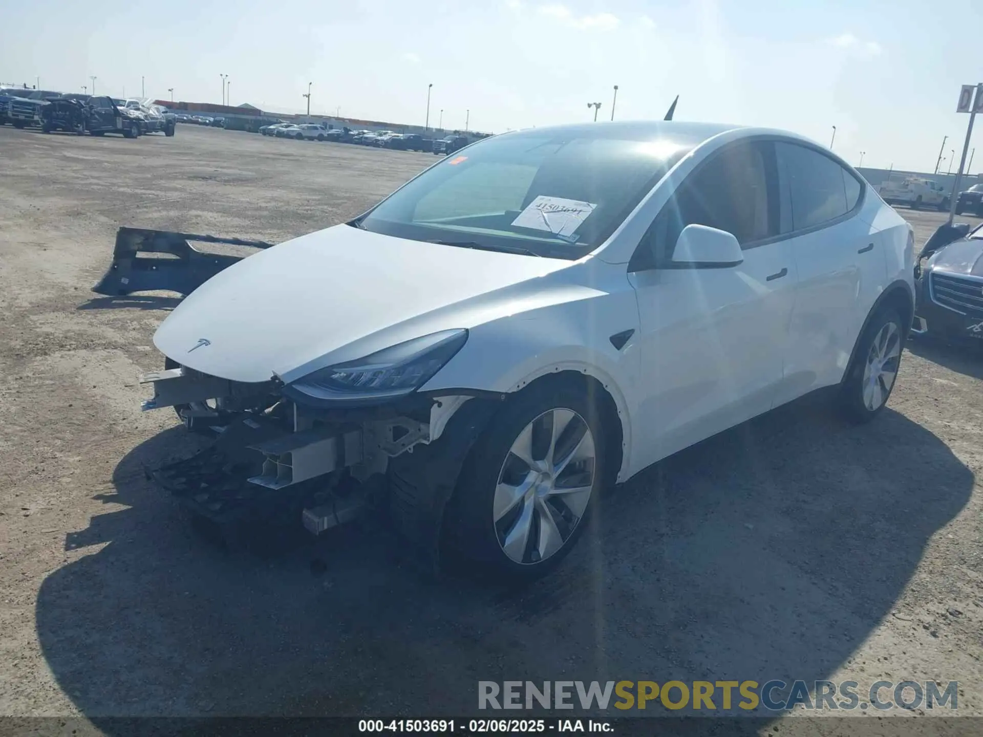 2 fotografías del automóvil dañado 5YJYGDEE3MF259793 TESLA MODEL Y 2021