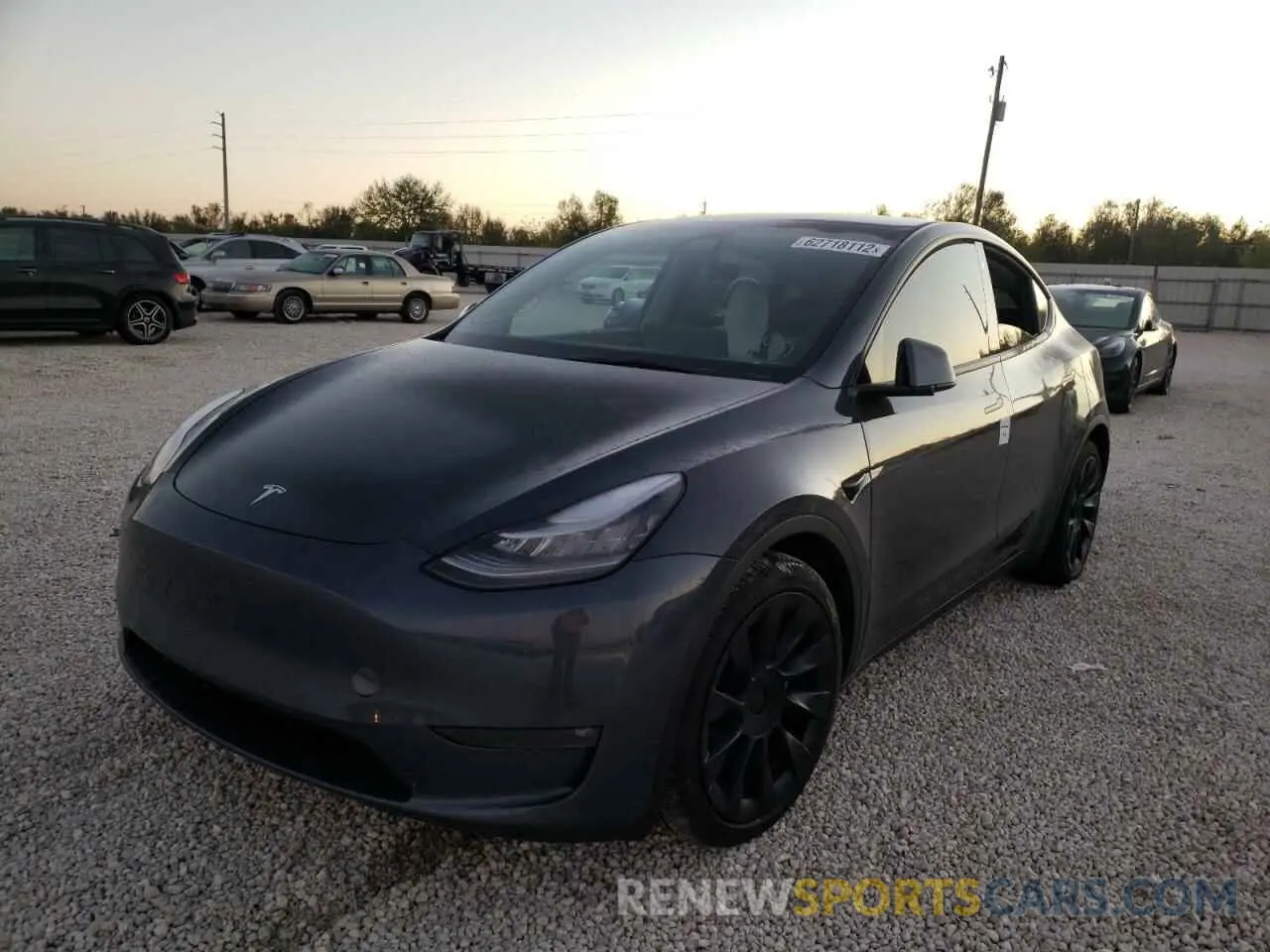 2 fotografías del automóvil dañado 5YJYGDEE4MF187065 TESLA MODEL Y 2021