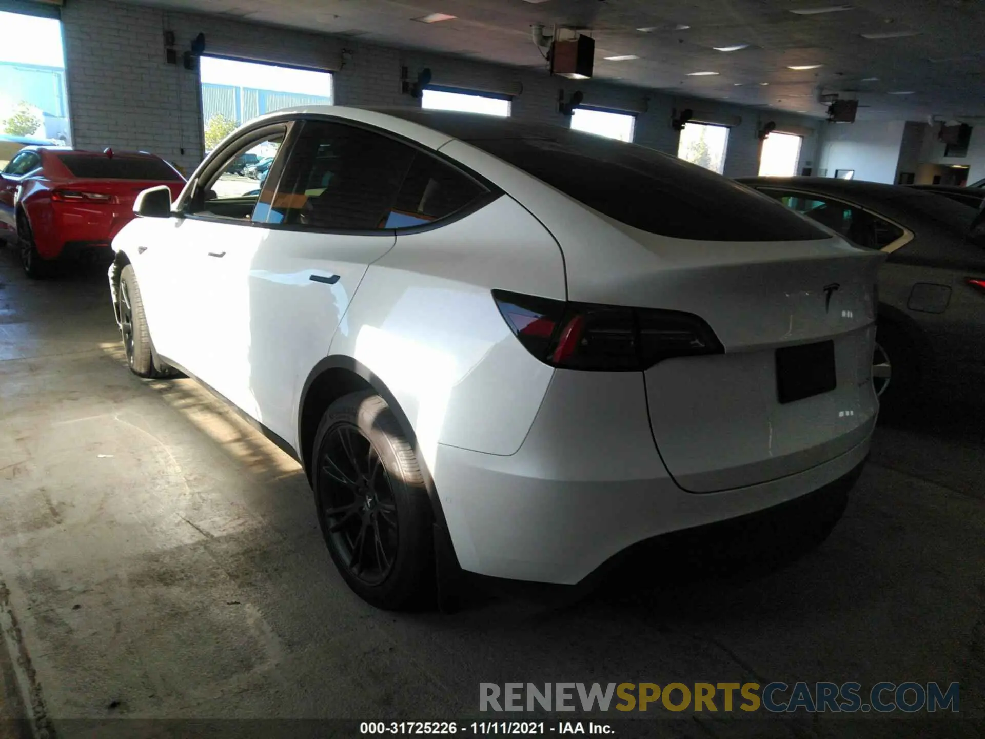 3 fotografías del automóvil dañado 5YJYGDEE4MF194324 TESLA MODEL Y 2021