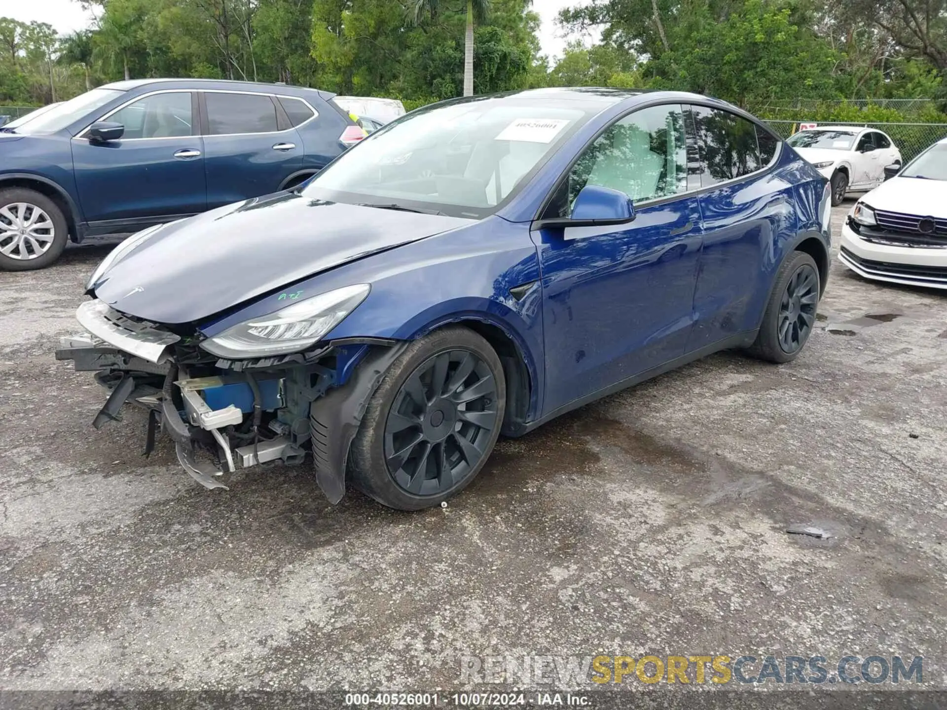 2 fotografías del automóvil dañado 5YJYGDEE4MF243120 TESLA MODEL Y 2021