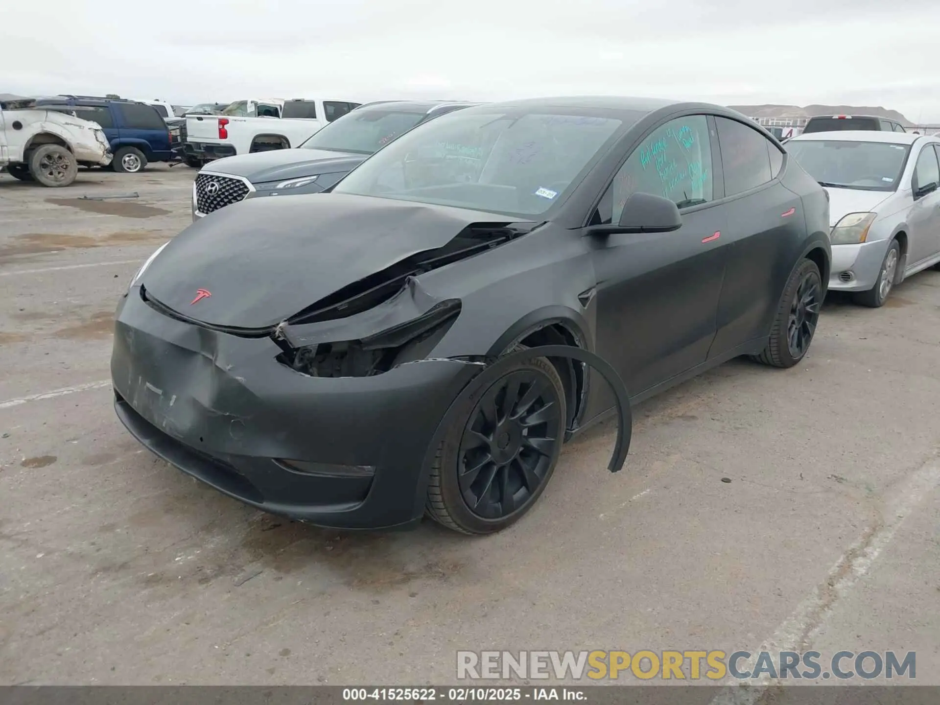 2 fotografías del automóvil dañado 5YJYGDEE5MF111774 TESLA MODEL Y 2021