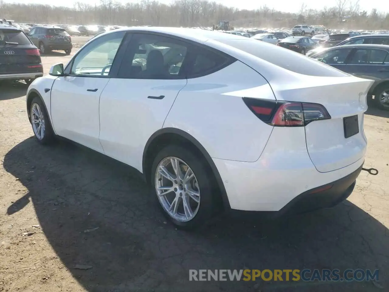 2 fotografías del automóvil dañado 5YJYGDEE5MF118045 TESLA MODEL Y 2021
