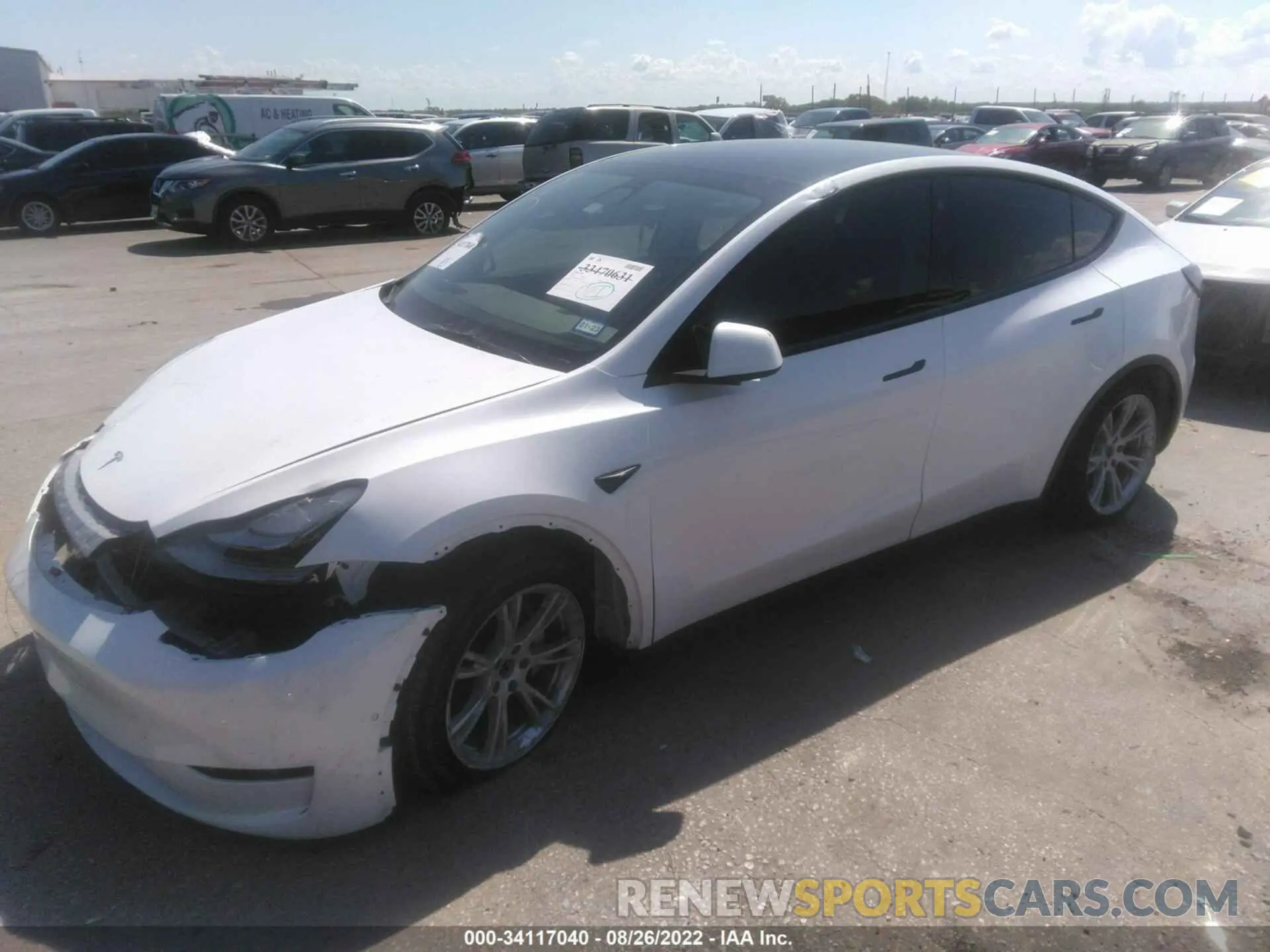 2 fotografías del automóvil dañado 5YJYGDEE5MF185390 TESLA MODEL Y 2021