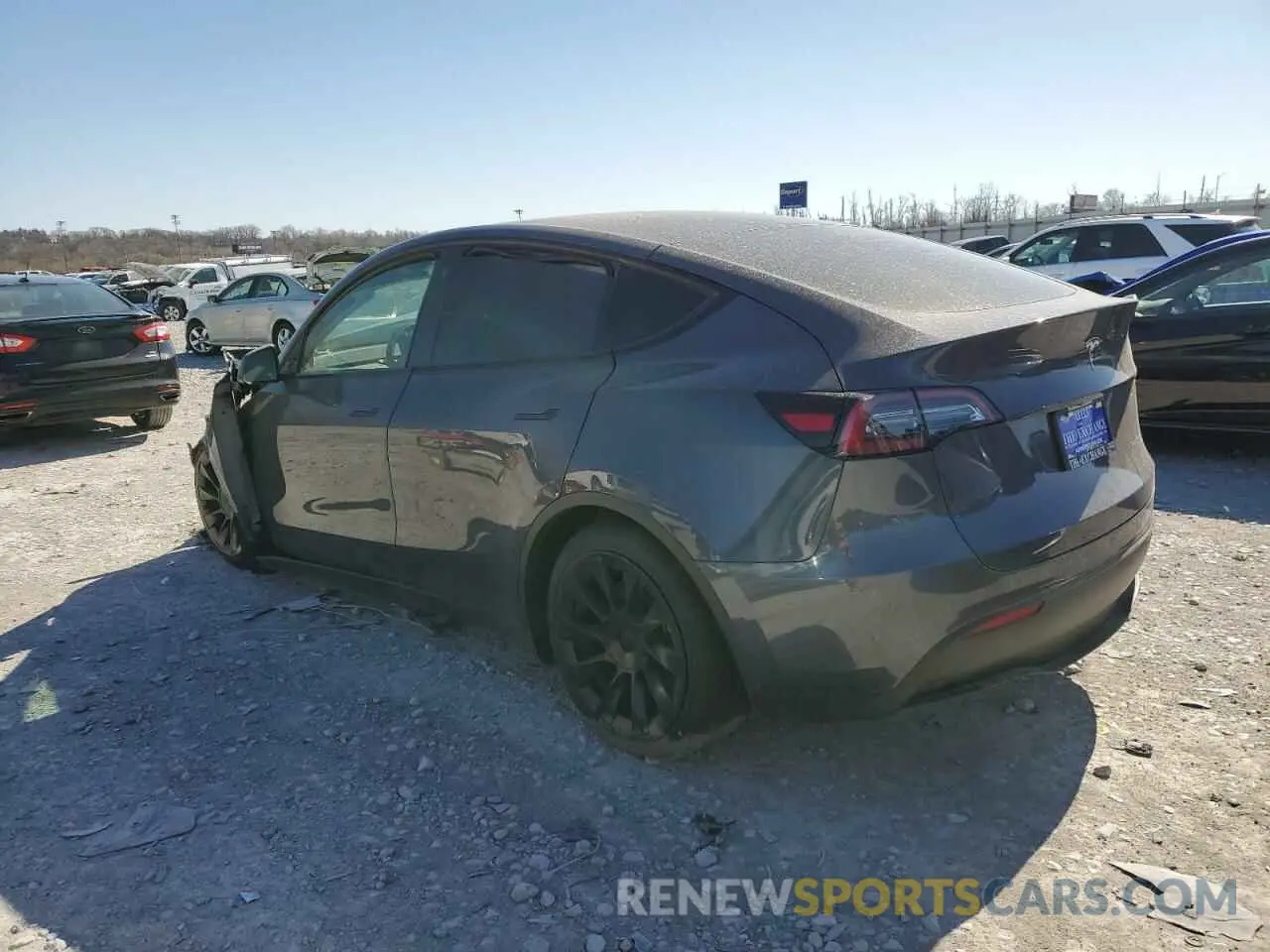 2 fotografías del automóvil dañado 5YJYGDEE5MF211051 TESLA MODEL Y 2021