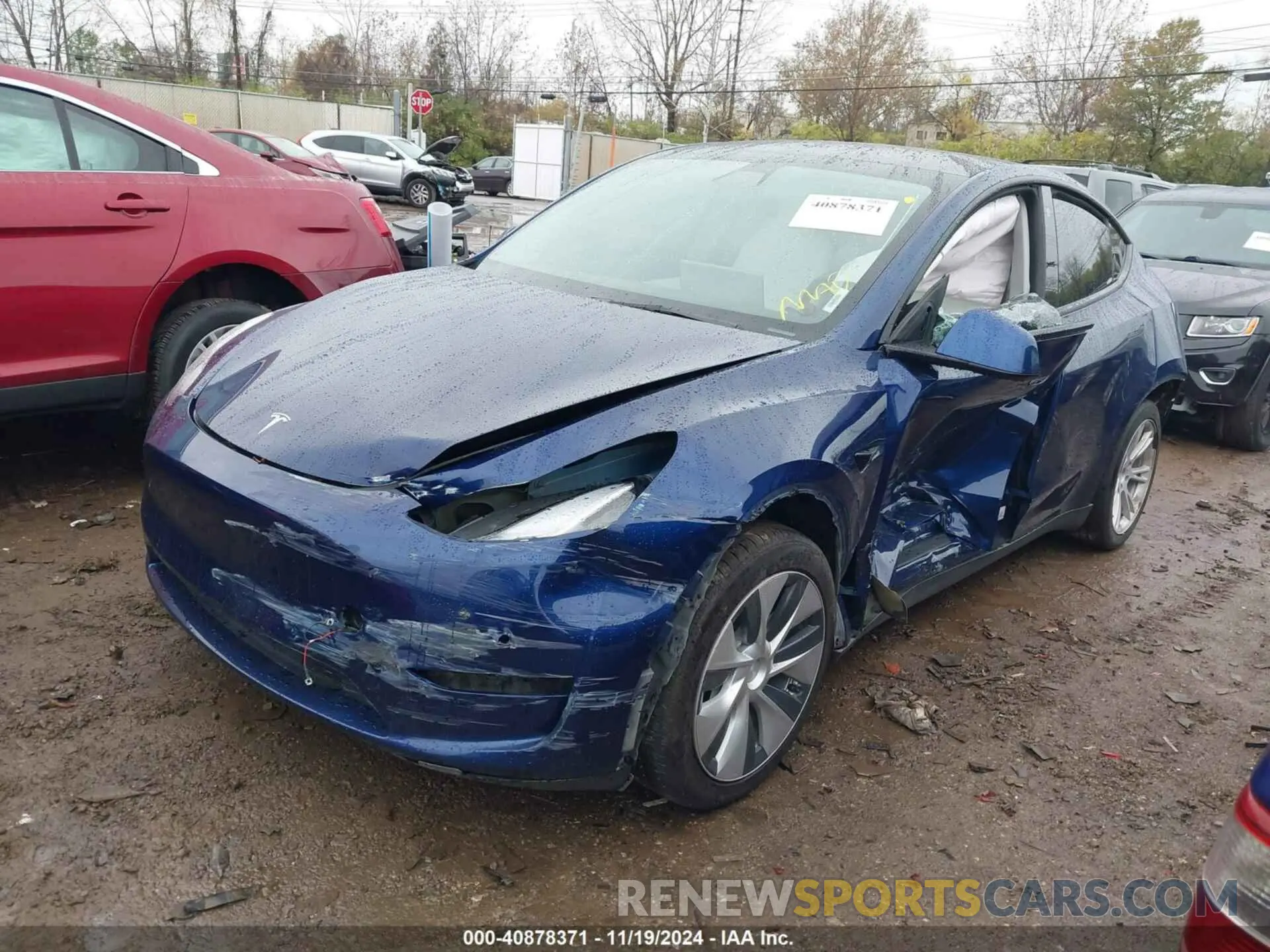 2 fotografías del automóvil dañado 5YJYGDEE5MF244728 TESLA MODEL Y 2021