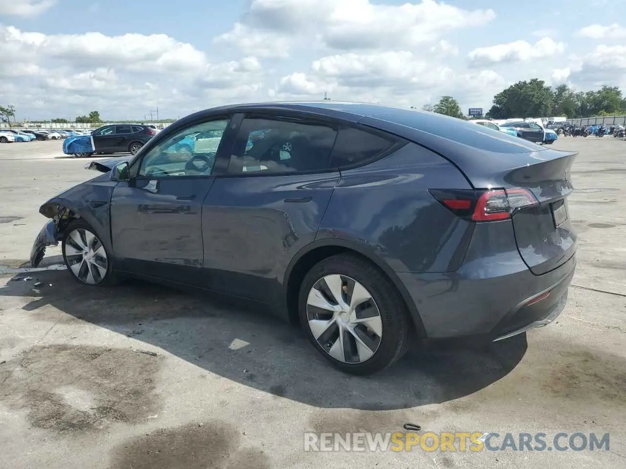 2 fotografías del automóvil dañado 5YJYGDEE5MF248486 TESLA MODEL Y 2021