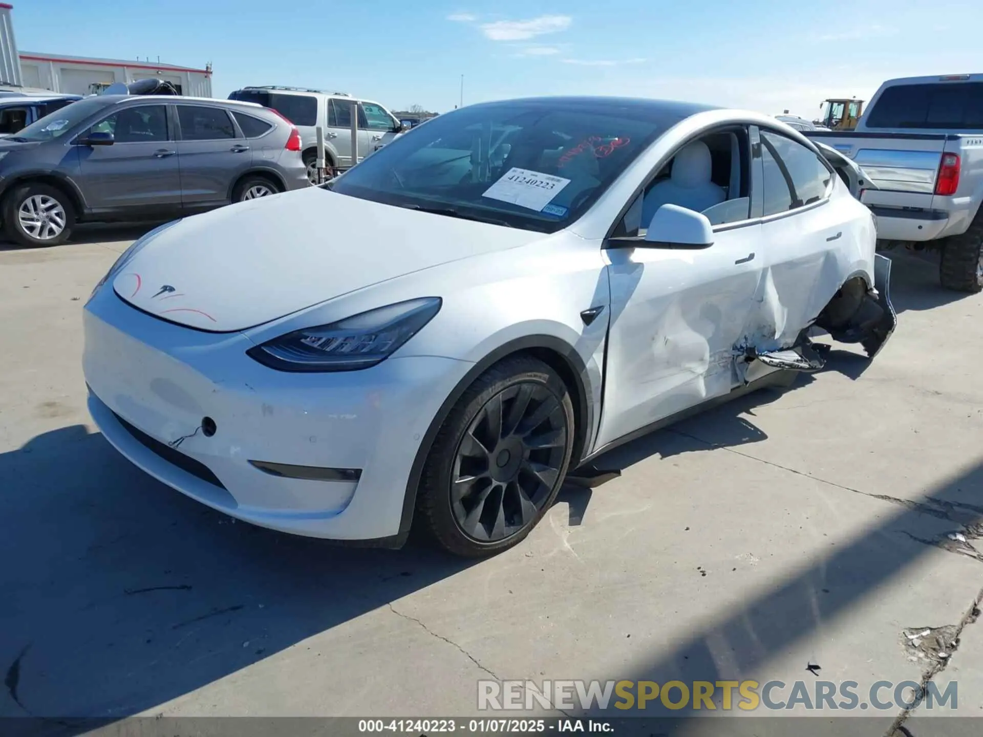 2 fotografías del automóvil dañado 5YJYGDEE5MF262968 TESLA MODEL Y 2021