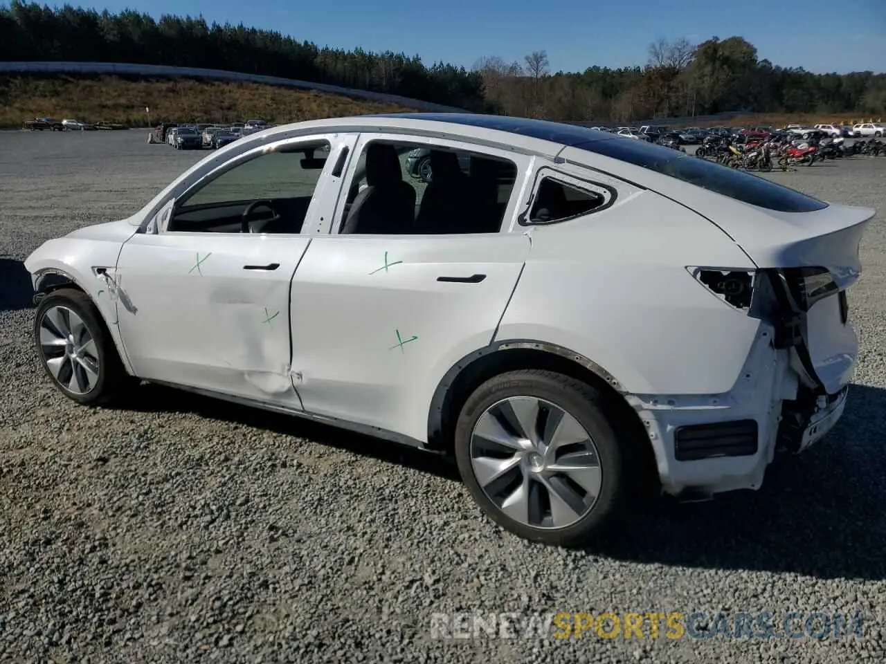 2 fotografías del automóvil dañado 5YJYGDEE5MF263893 TESLA MODEL Y 2021