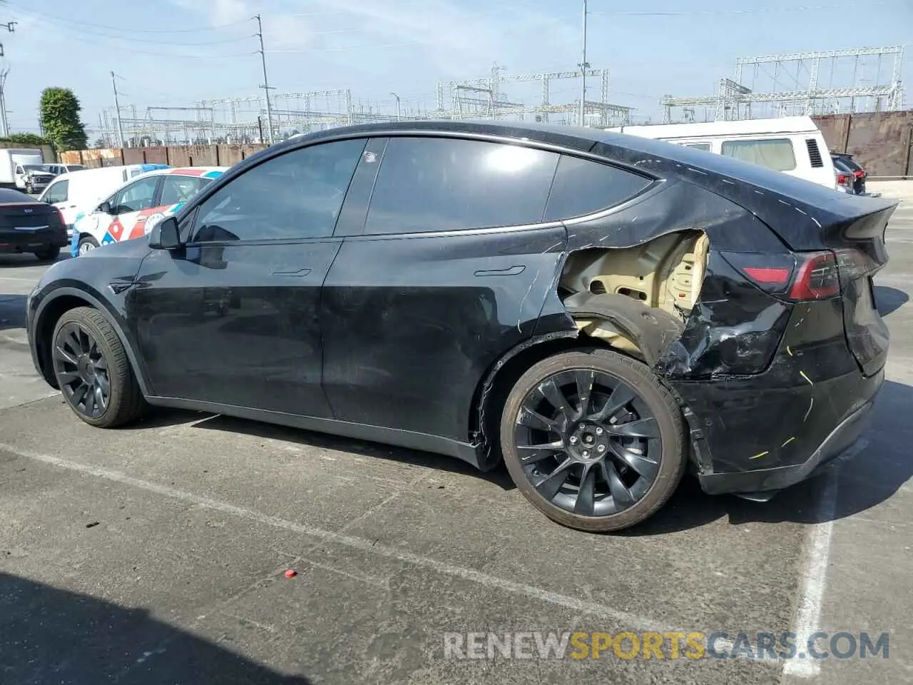 2 fotografías del automóvil dañado 5YJYGDEE5MF282363 TESLA MODEL Y 2021