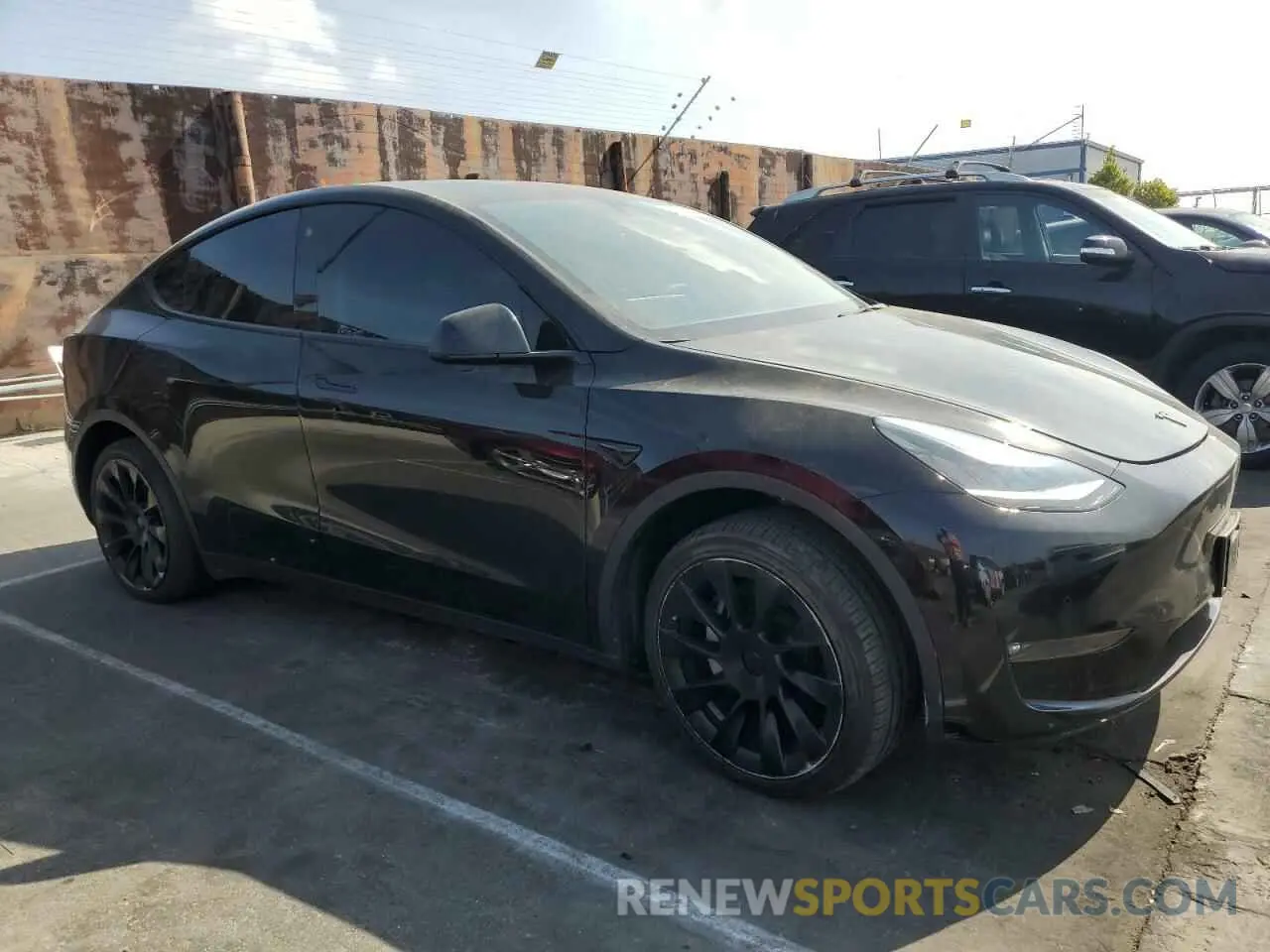 4 fotografías del automóvil dañado 5YJYGDEE5MF282363 TESLA MODEL Y 2021