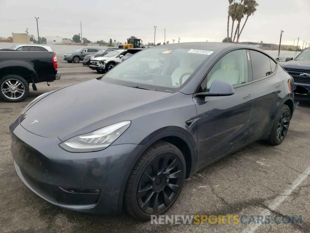 2 fotografías del automóvil dañado 5YJYGDEE5MF283741 TESLA MODEL Y 2021