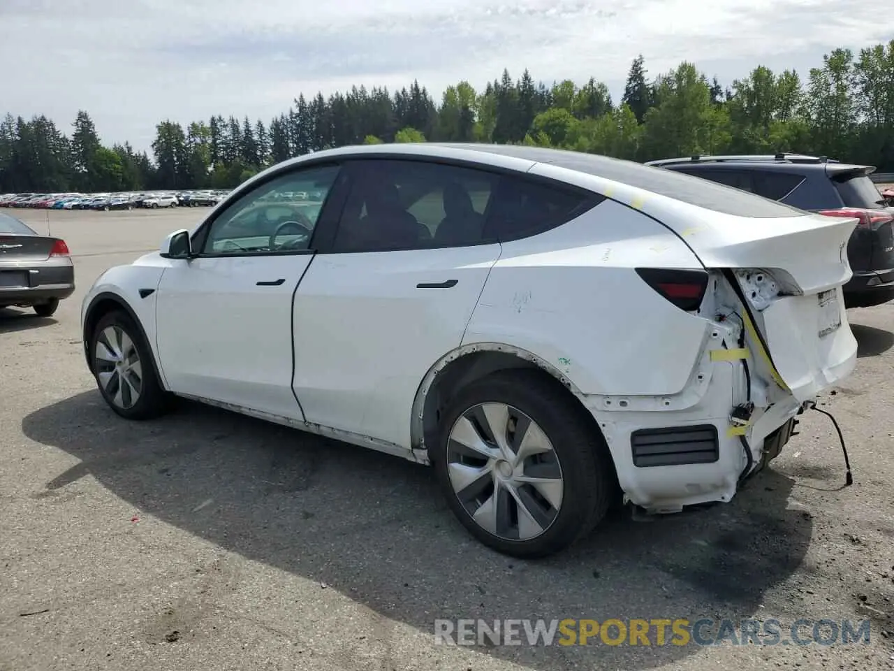 2 fotografías del automóvil dañado 5YJYGDEE5MF285098 TESLA MODEL Y 2021