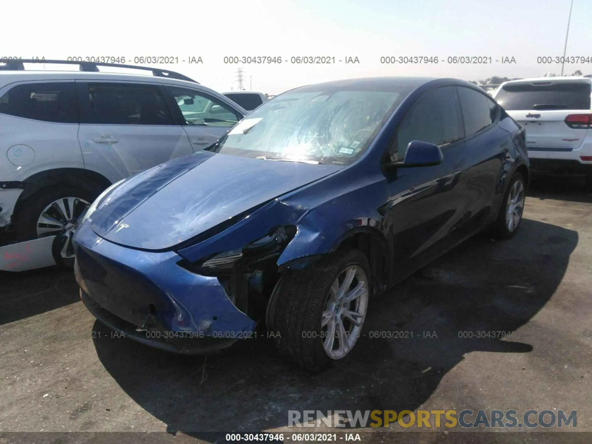 2 fotografías del automóvil dañado 5YJYGDEE6MF075349 TESLA MODEL Y 2021