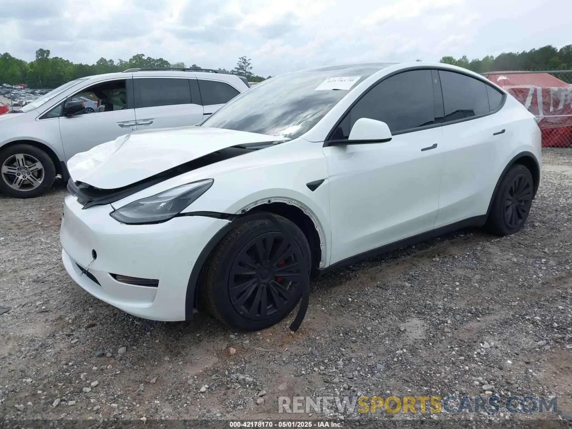 2 fotografías del automóvil dañado 5YJYGDEE6MF083029 TESLA MODEL Y 2021