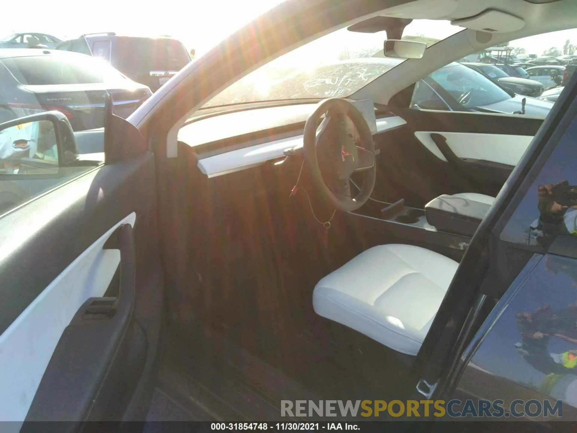 5 fotografías del automóvil dañado 5YJYGDEE6MF088697 TESLA MODEL Y 2021