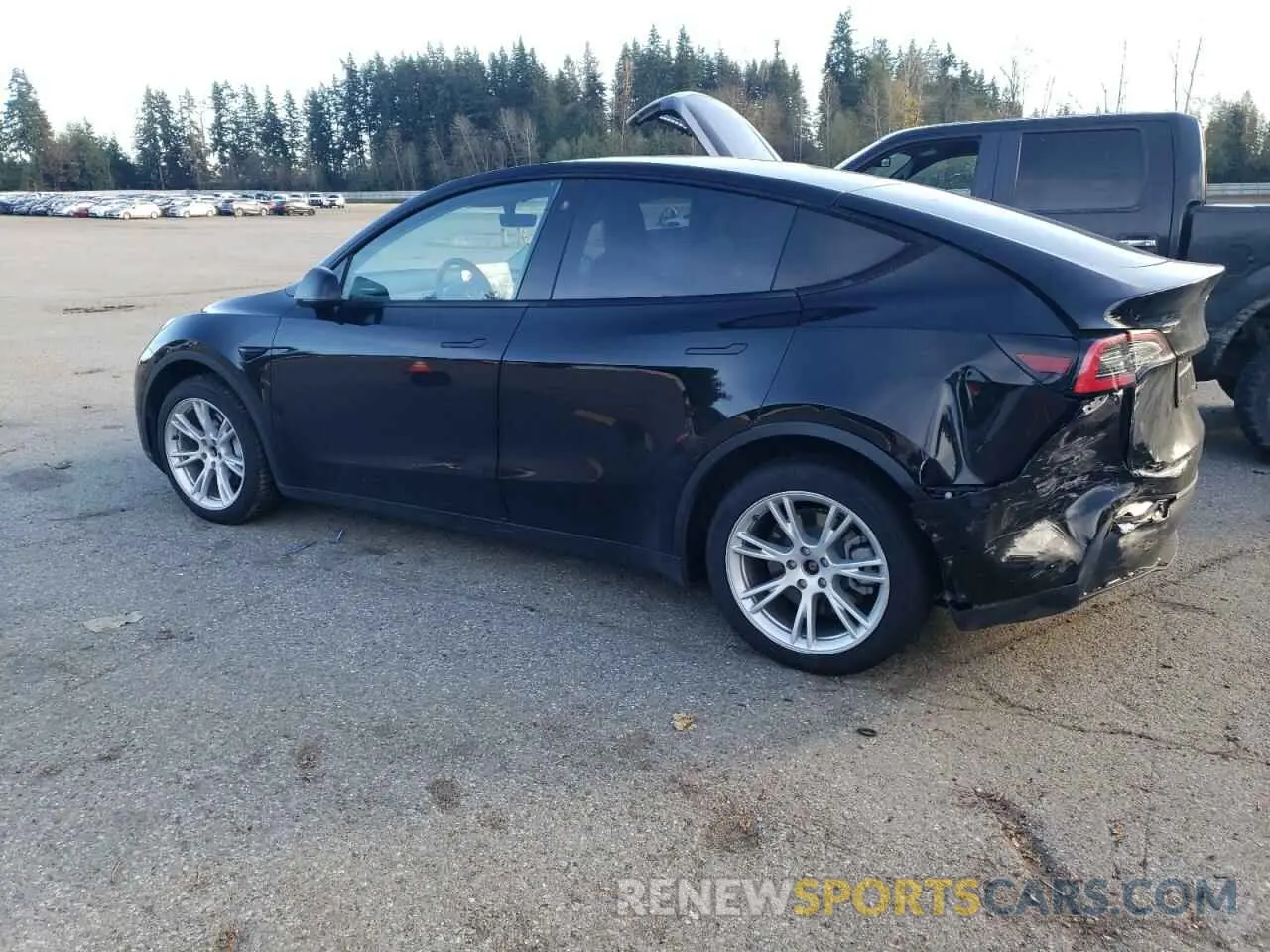 2 fotografías del automóvil dañado 5YJYGDEE6MF091566 TESLA MODEL Y 2021