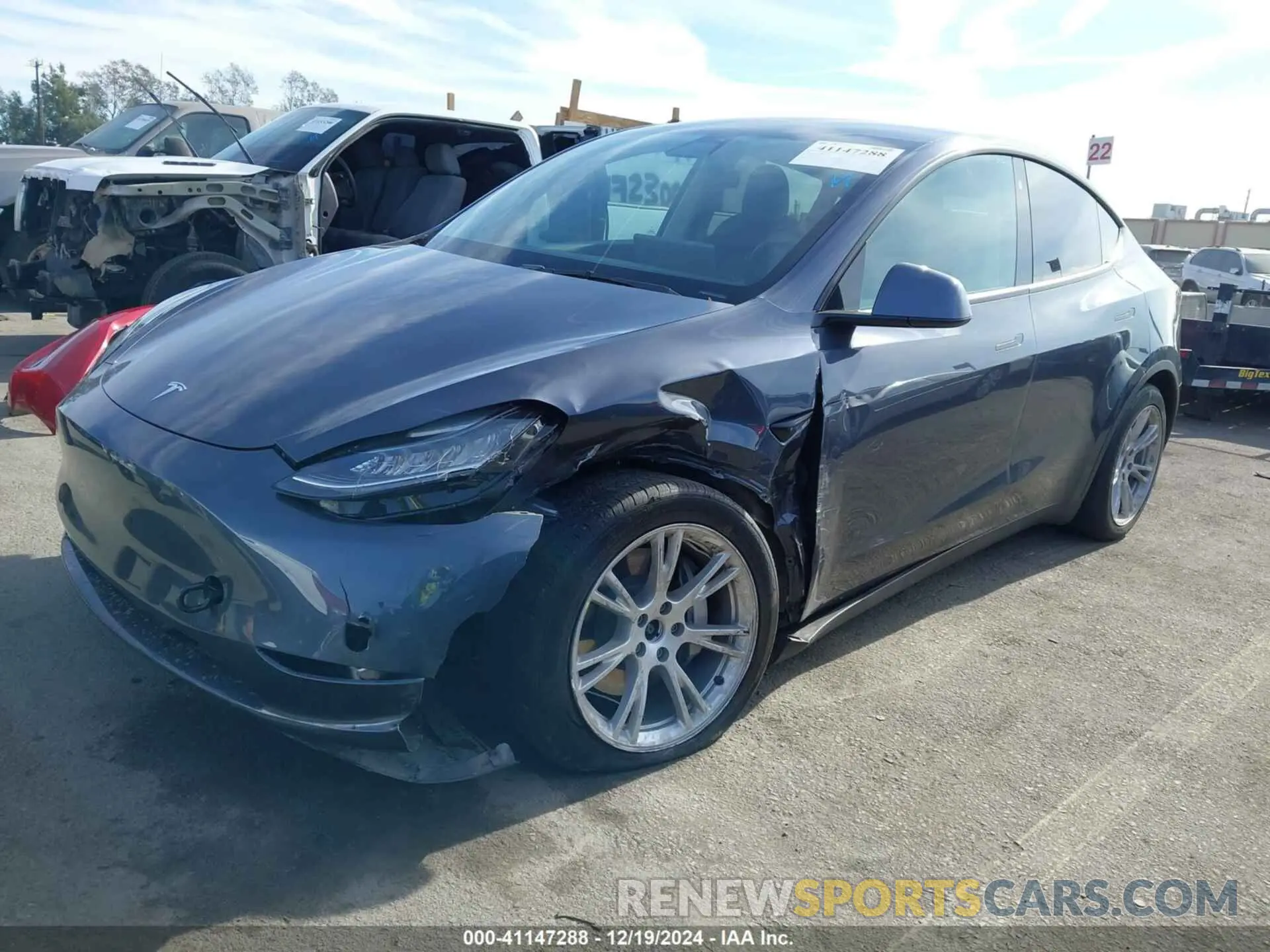 2 fotografías del automóvil dañado 5YJYGDEE6MF094936 TESLA MODEL Y 2021