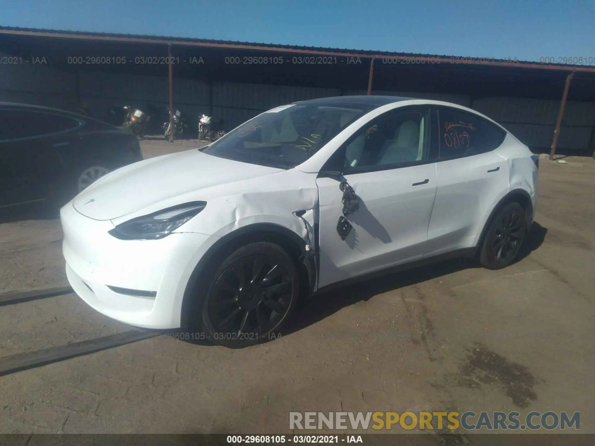 2 fotografías del automóvil dañado 5YJYGDEE6MF095794 TESLA MODEL Y 2021