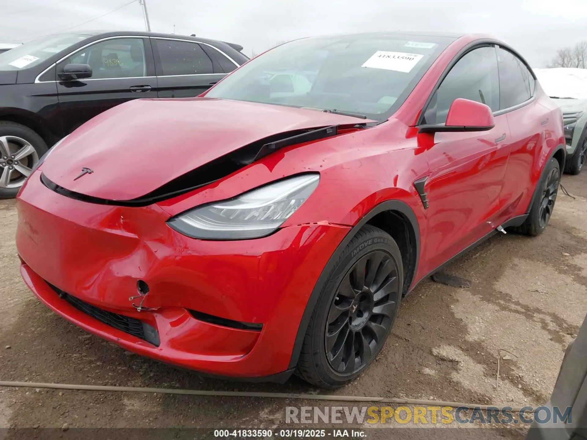 2 fotografías del automóvil dañado 5YJYGDEE6MF182238 TESLA MODEL Y 2021
