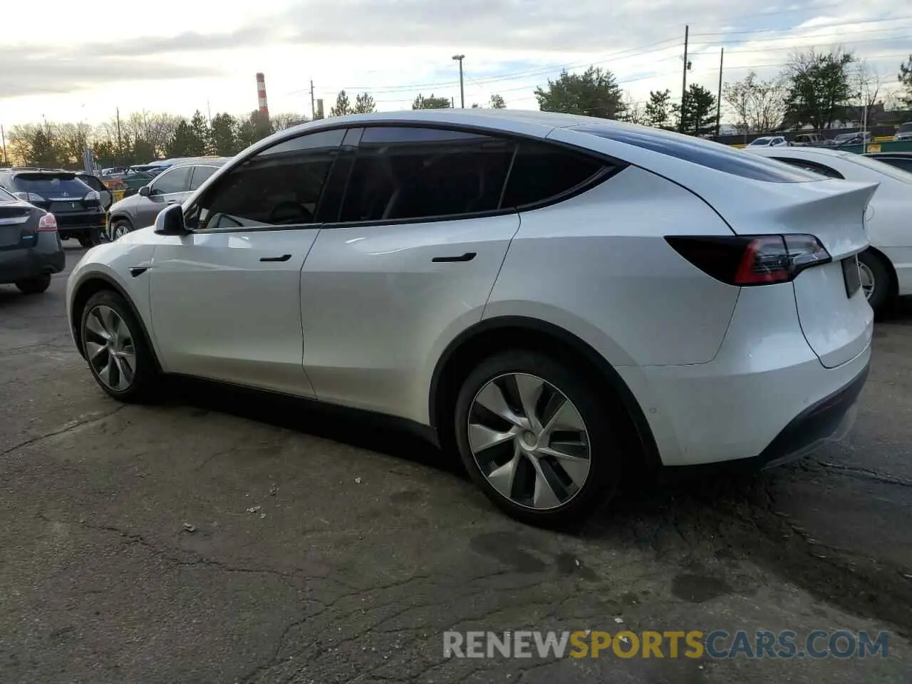 2 fotografías del automóvil dañado 5YJYGDEE6MF187603 TESLA MODEL Y 2021