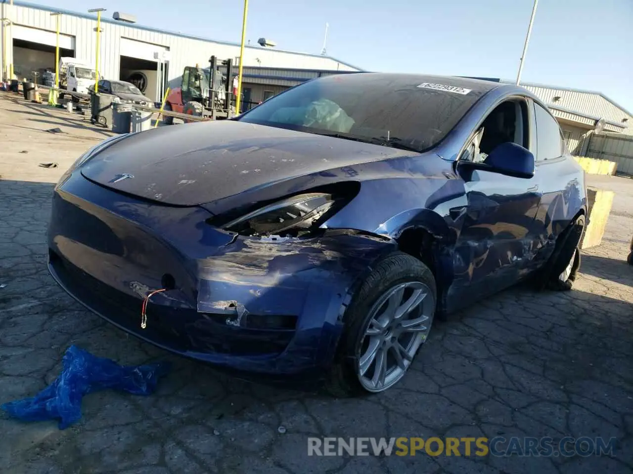 2 fotografías del automóvil dañado 5YJYGDEE6MF244995 TESLA MODEL Y 2021