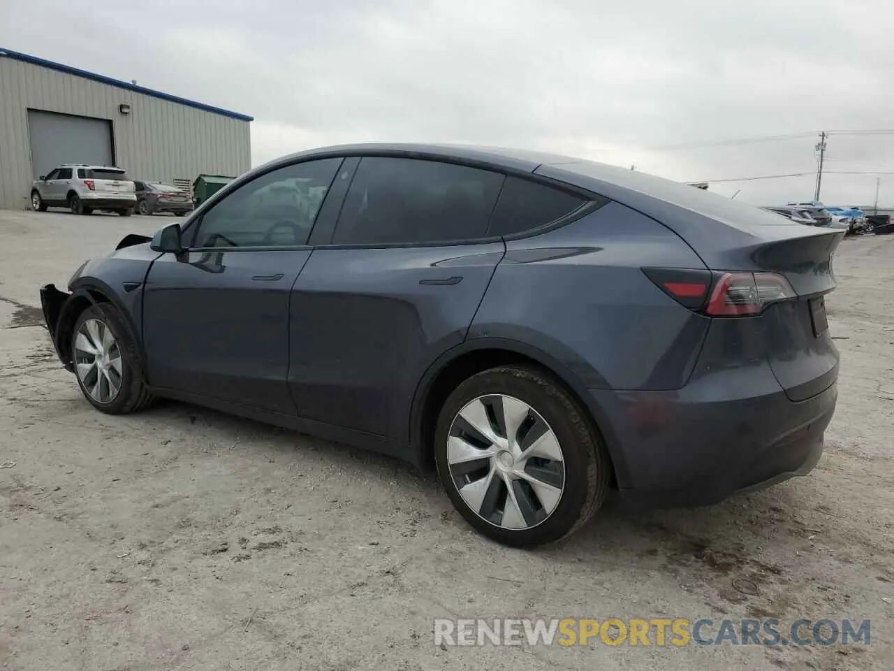 2 fotografías del automóvil dañado 5YJYGDEE6MF265667 TESLA MODEL Y 2021