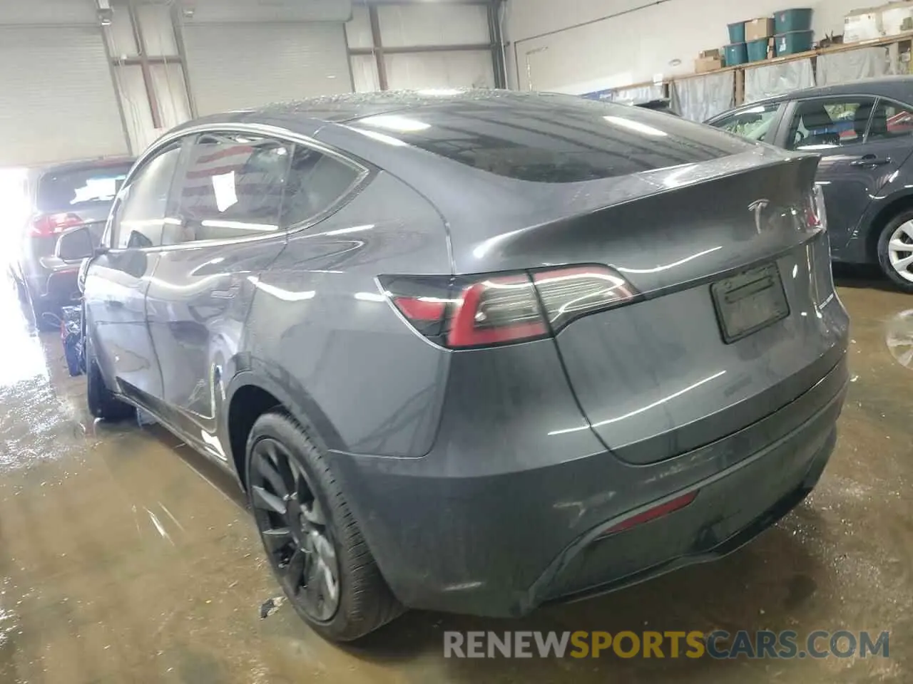 2 fotografías del automóvil dañado 5YJYGDEE6MF298300 TESLA MODEL Y 2021