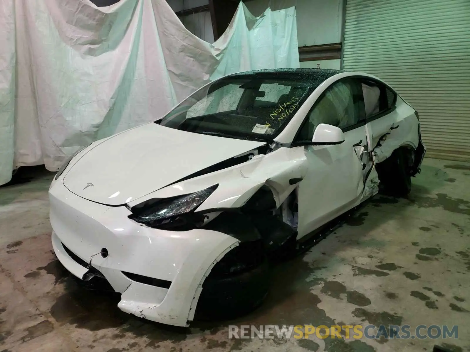 2 fotografías del automóvil dañado 5YJYGDEE7MF123800 TESLA MODEL Y 2021