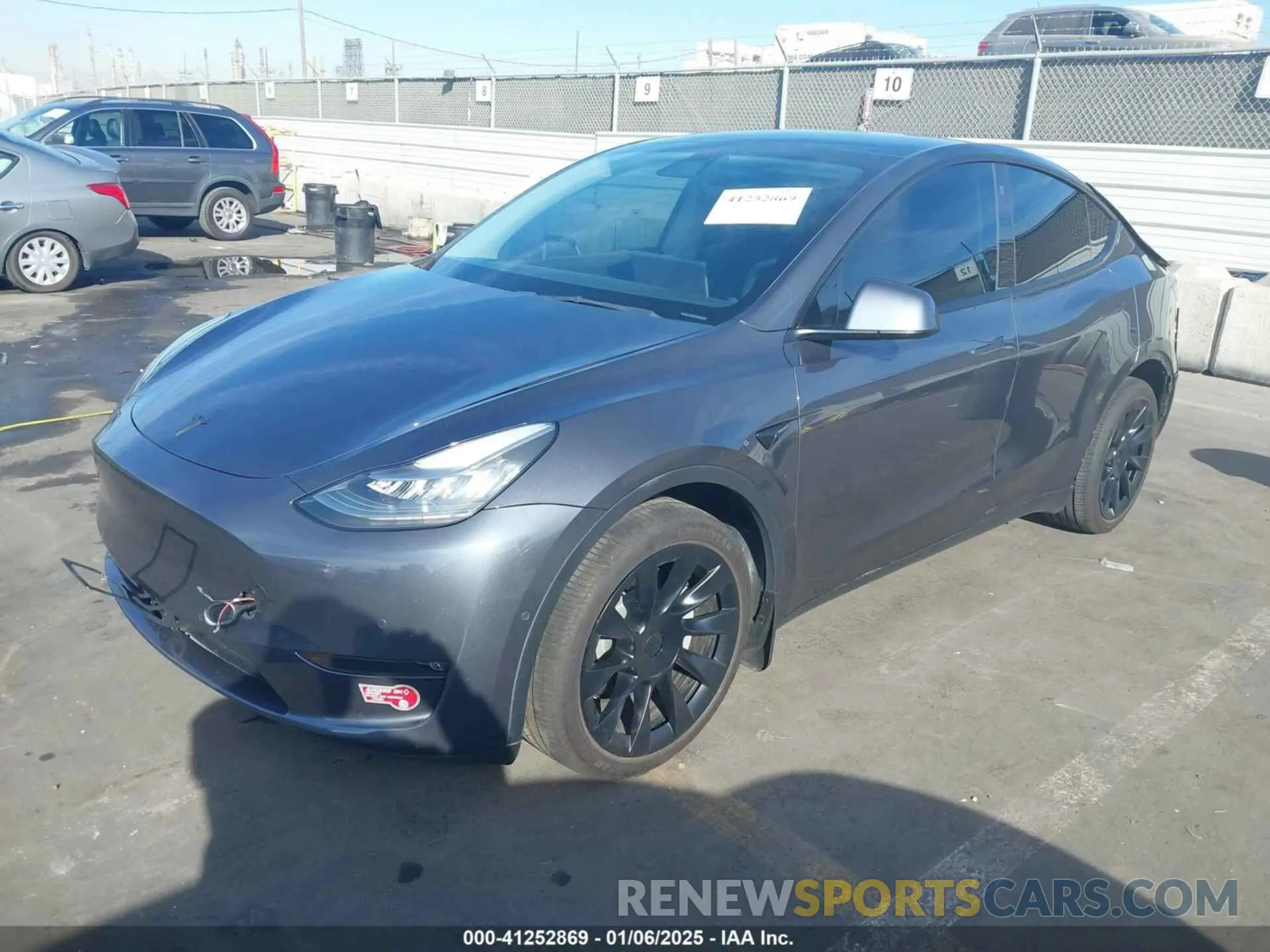 2 fotografías del automóvil dañado 5YJYGDEE7MF149037 TESLA MODEL Y 2021