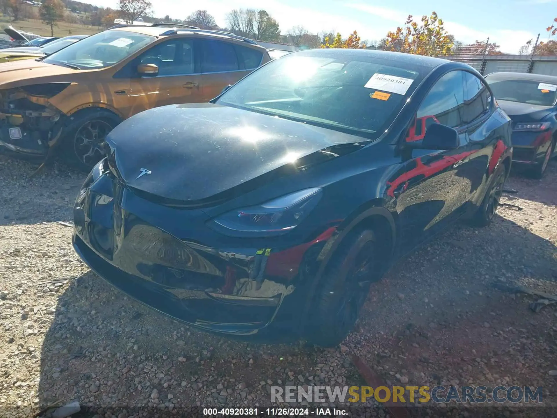 2 fotografías del automóvil dañado 5YJYGDEE7MF185651 TESLA MODEL Y 2021