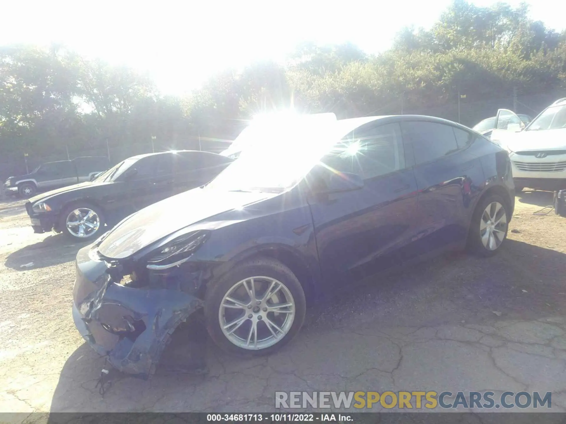 2 fotografías del automóvil dañado 5YJYGDEE7MF224562 TESLA MODEL Y 2021