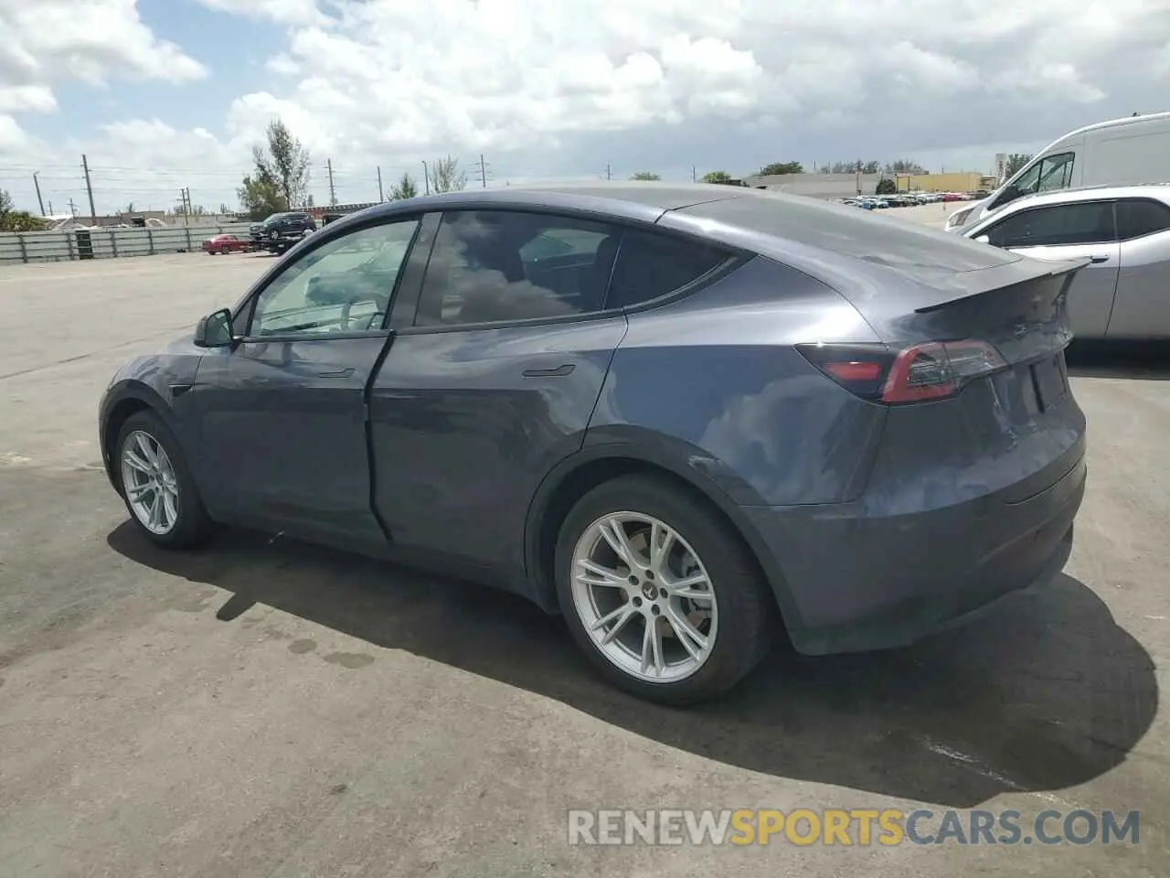 2 fotografías del automóvil dañado 5YJYGDEE7MF262177 TESLA MODEL Y 2021