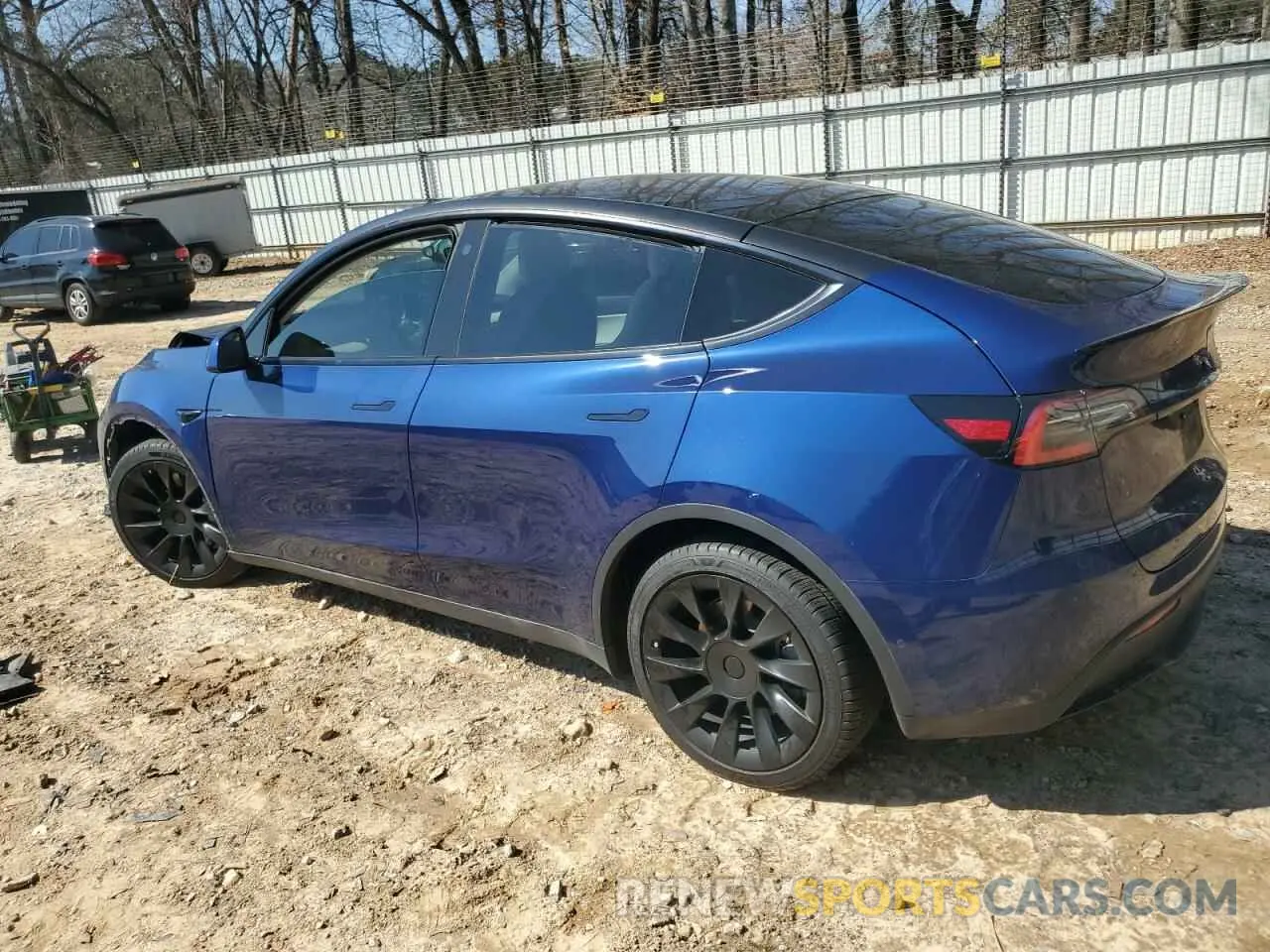 2 fotografías del automóvil dañado 5YJYGDEE8MF067432 TESLA MODEL Y 2021